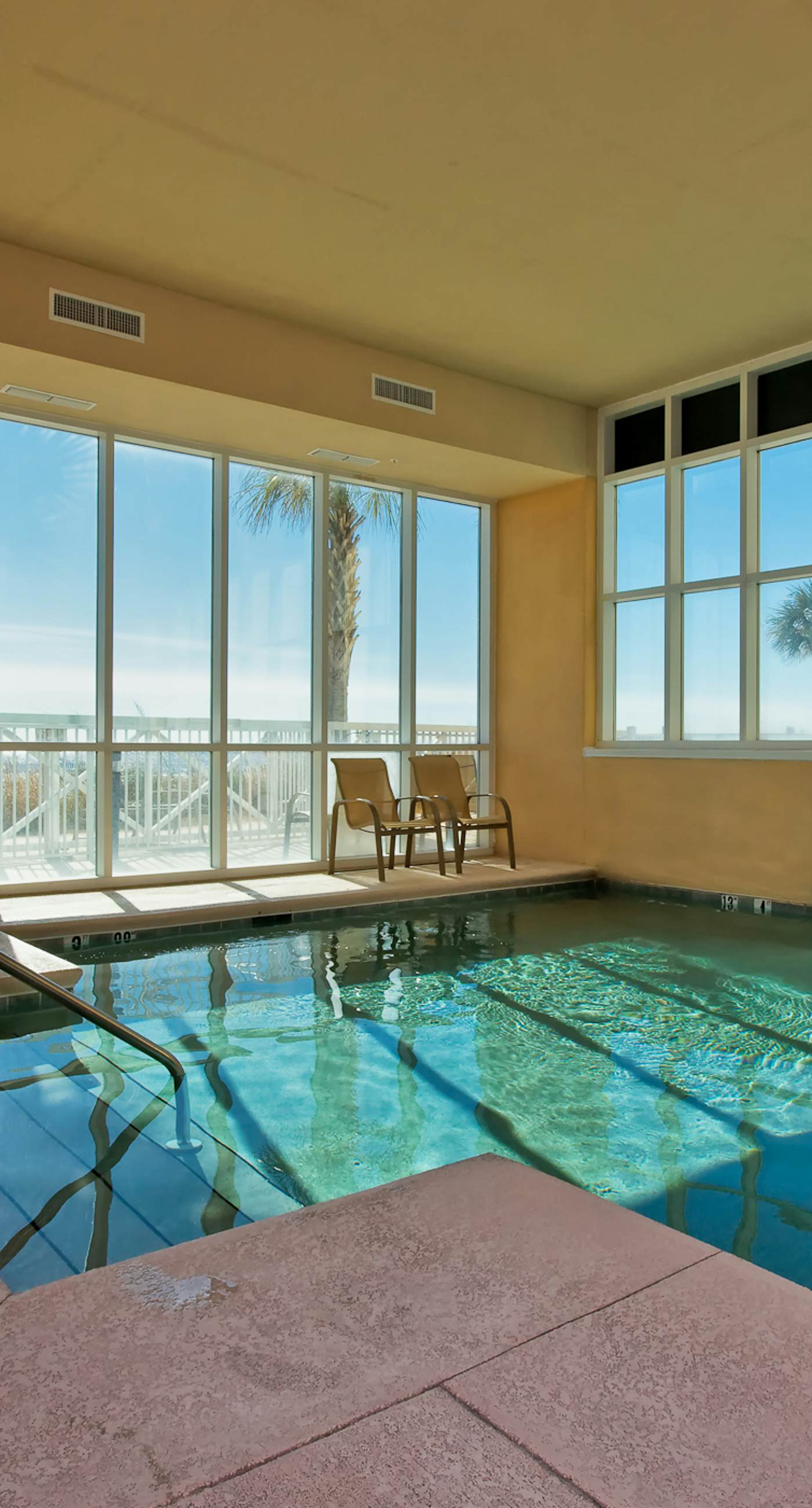 Gulf front condo w swim-through outdoor & indoor pool, hot tub, and sauna