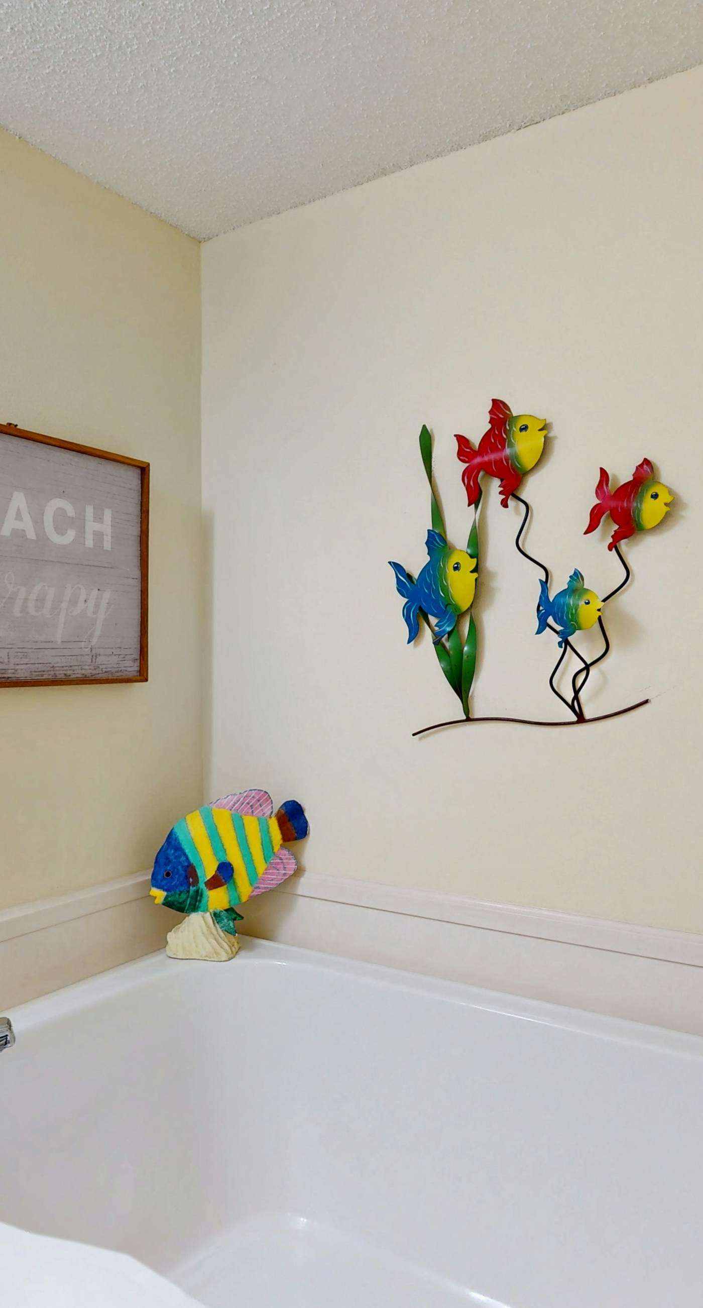 Beachfront, corner condo w a furnished balcony, shared pool, & grilling area