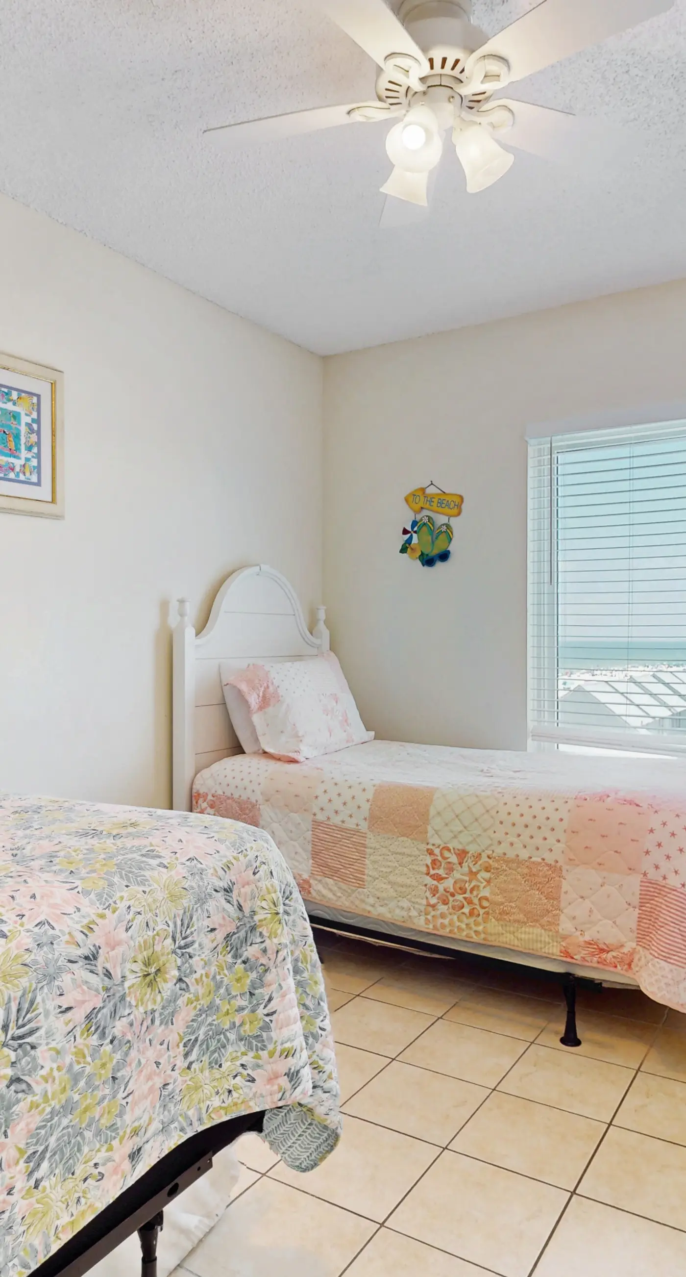 Beachfront, corner condo w a furnished balcony, shared pool, & grilling area