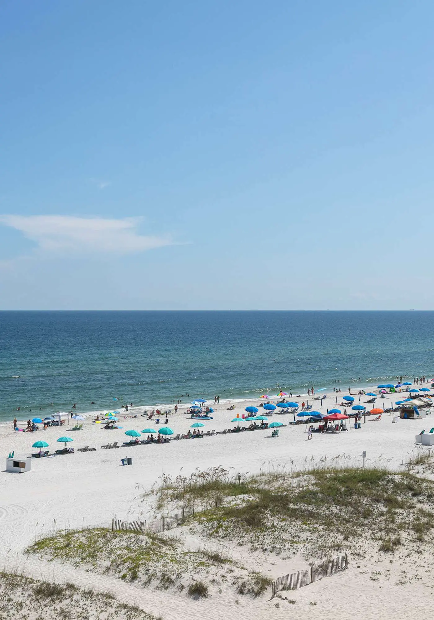 Beachfront, corner condo w a furnished balcony, shared pool, & grilling area