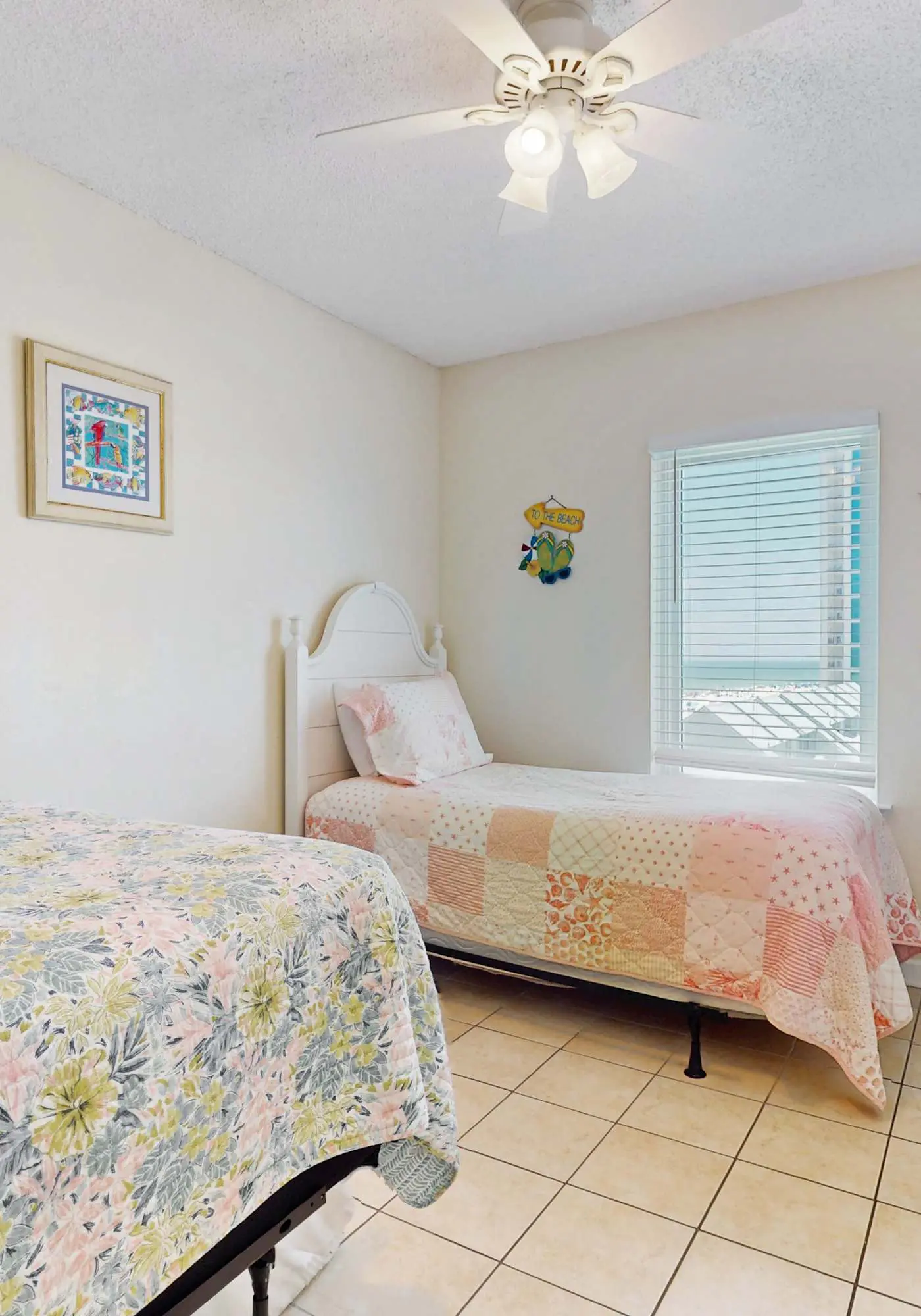 Beachfront, corner condo w a furnished balcony, shared pool, & grilling area