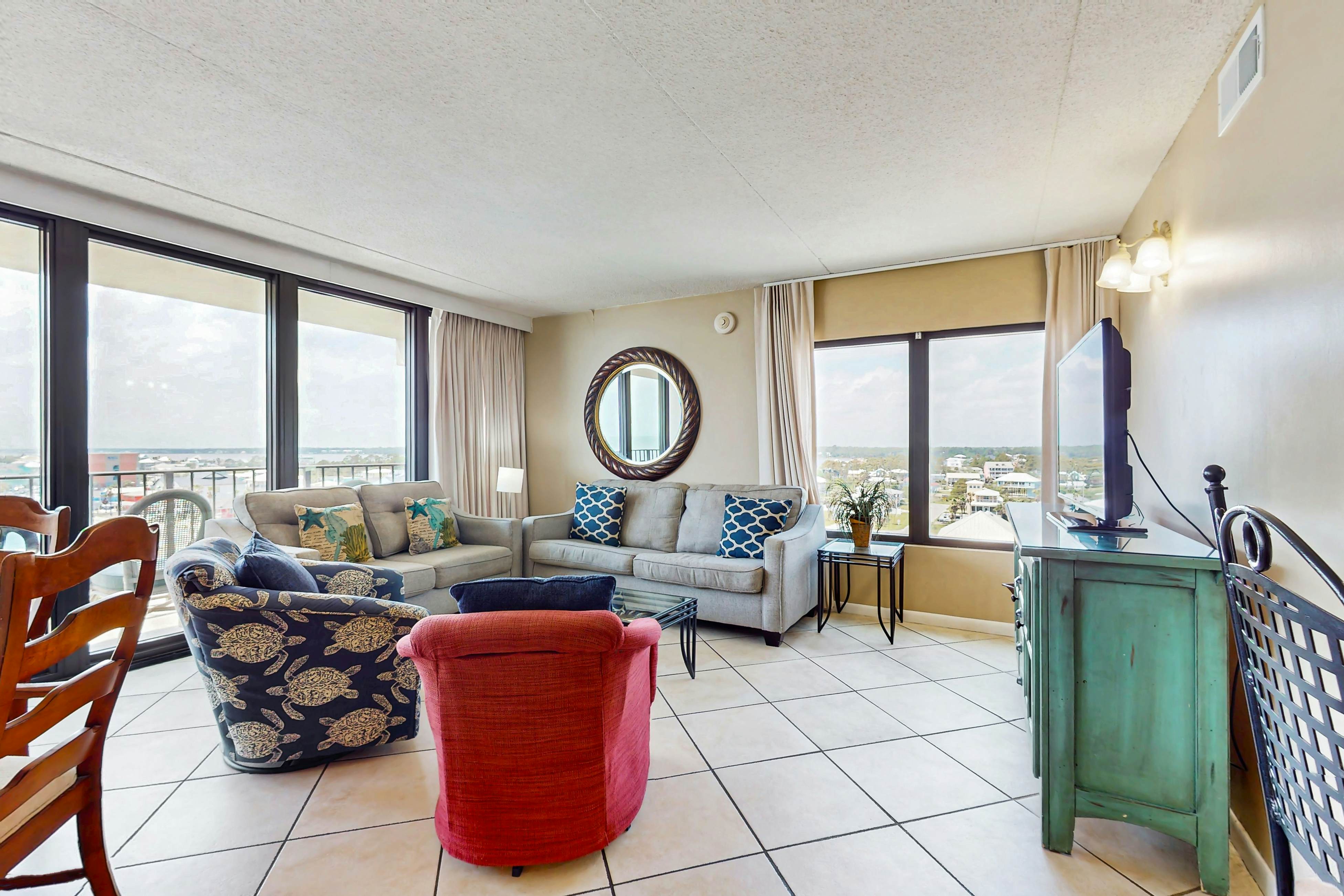 Gulf-view condo in a beachfront building with balcony, outdoor pool, gym