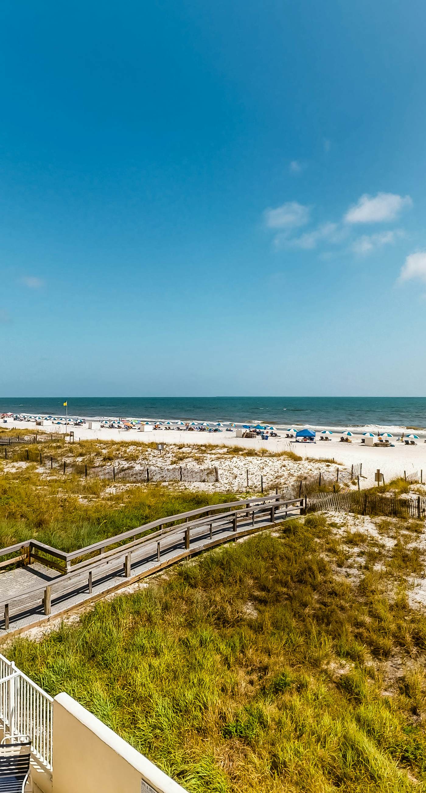Ocean & Gulf front condo w/furnished balcony, shared in/outdoor pools, & hot tub