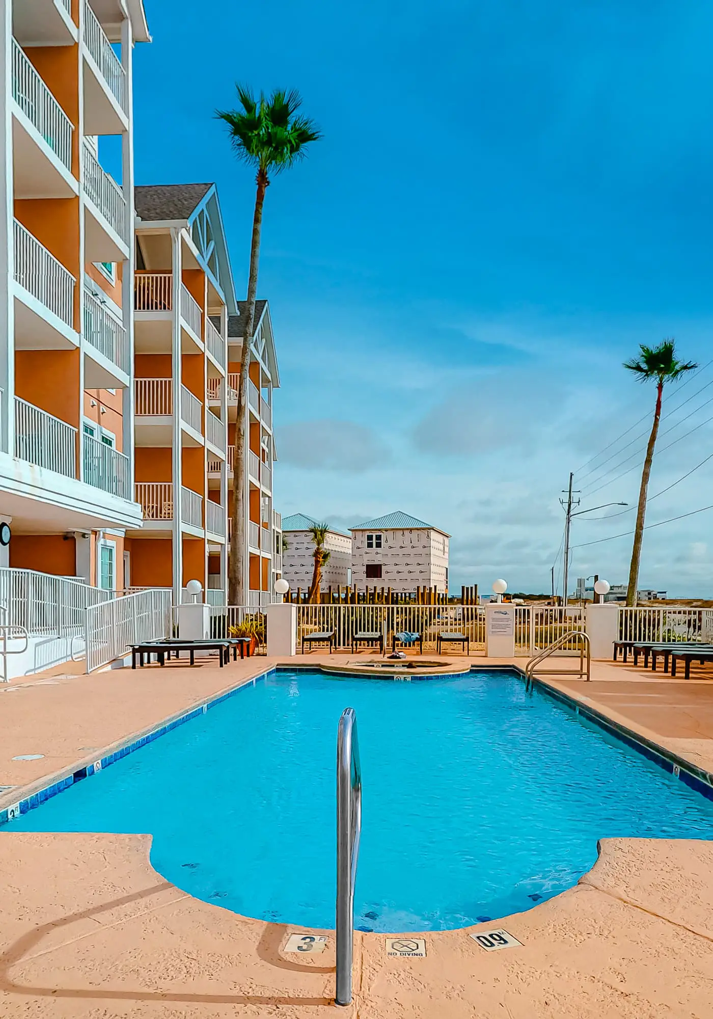 Second Floor Condo w Shared Pool & Hot Tub, WiFi, Central AC, and Washer Dryer