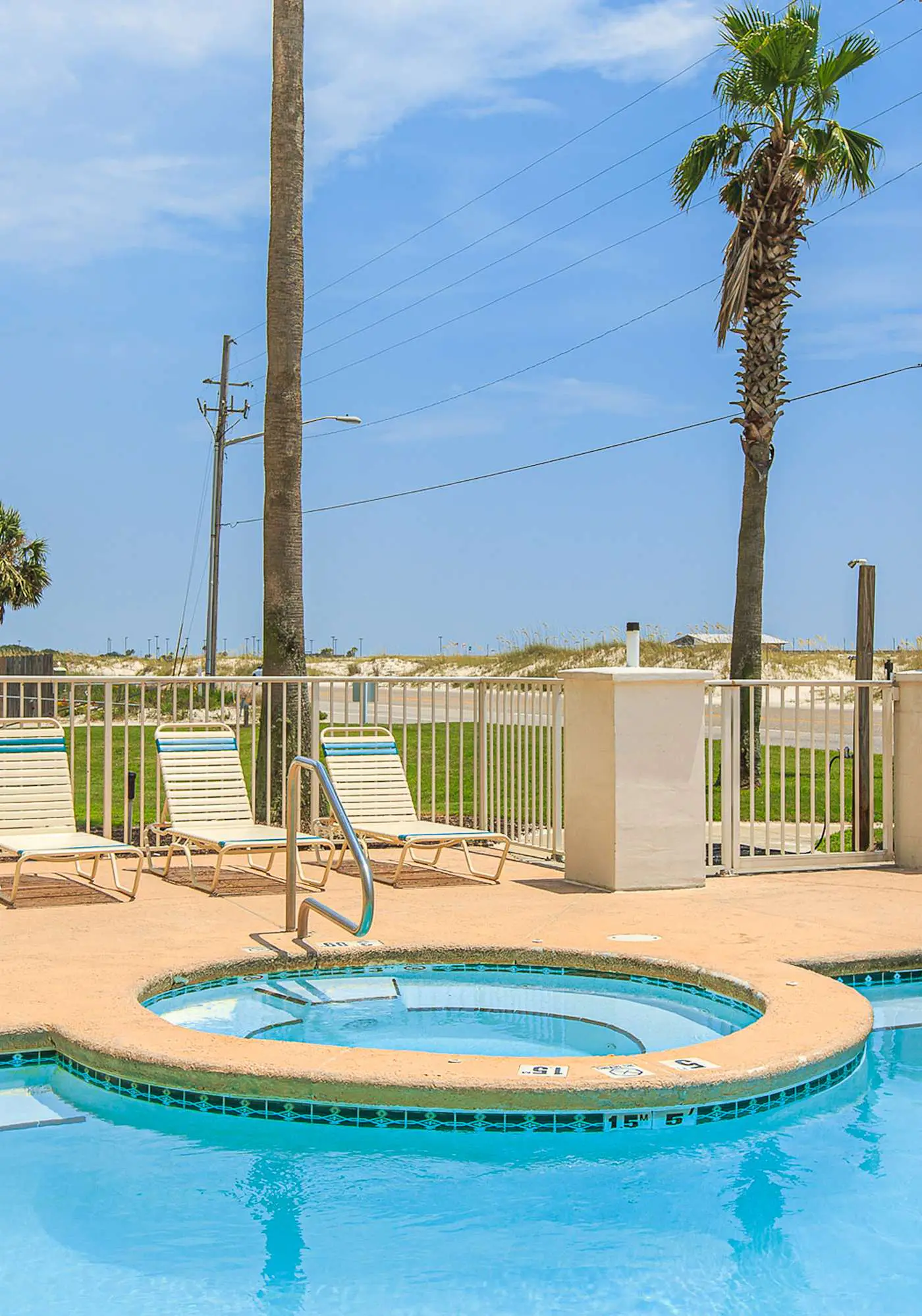 Second Floor Condo w Shared Pool & Hot Tub, WiFi, Central AC, and Washer Dryer
