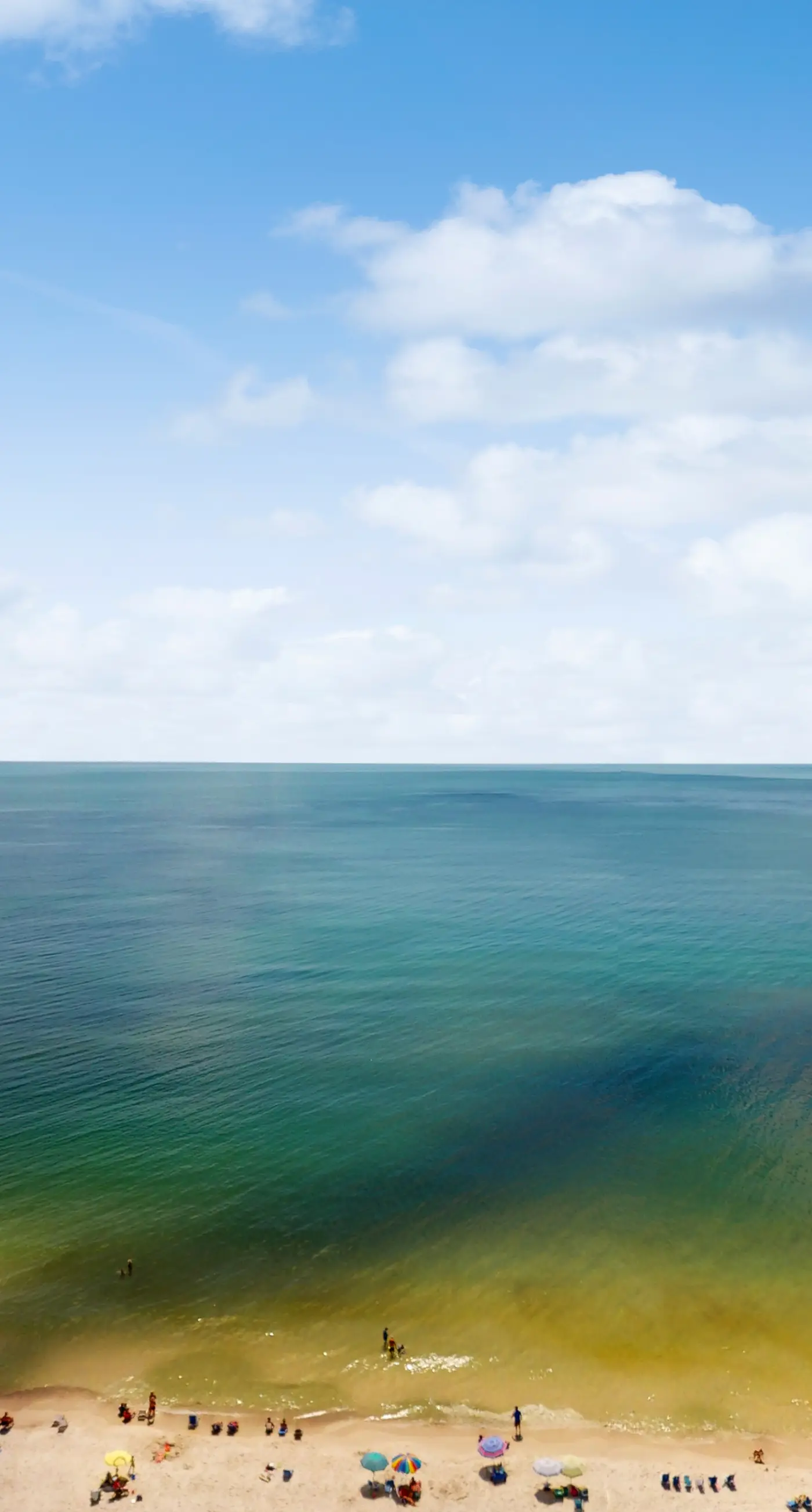 Penthouse-level, waterfront condo with epic Gulf-view balcony, pools, & gym