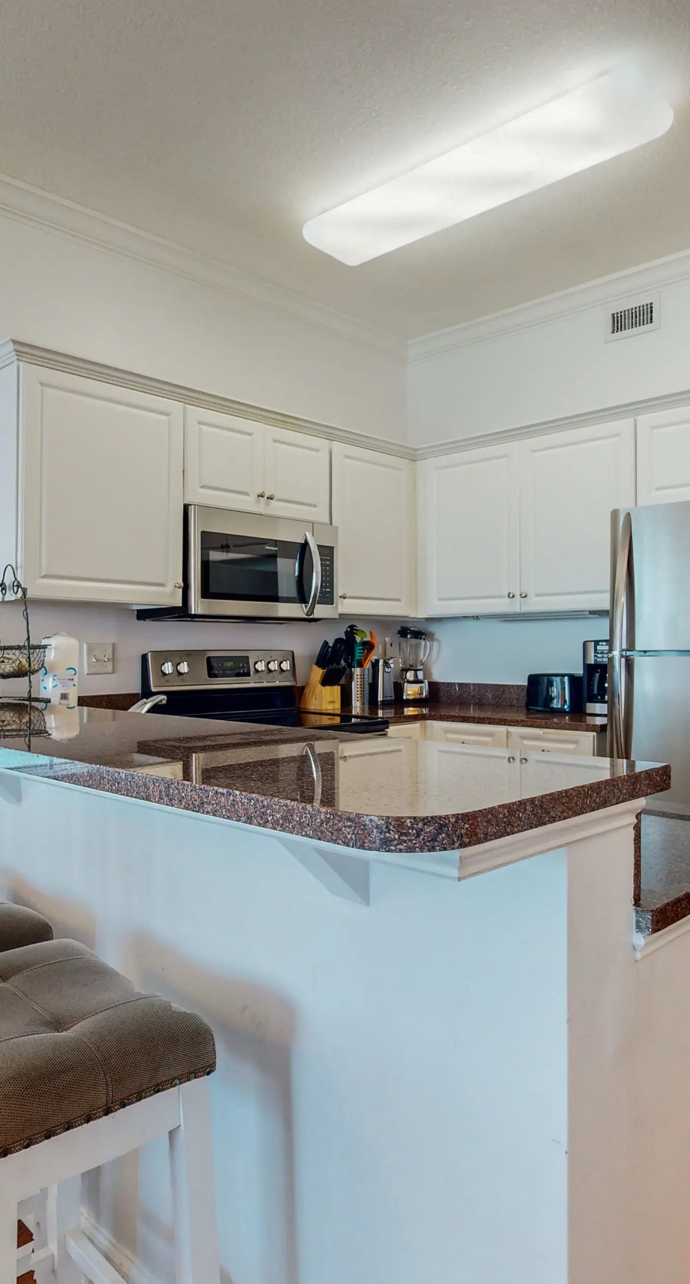 Penthouse-level, waterfront condo with epic Gulf-view balcony, pools, & gym
