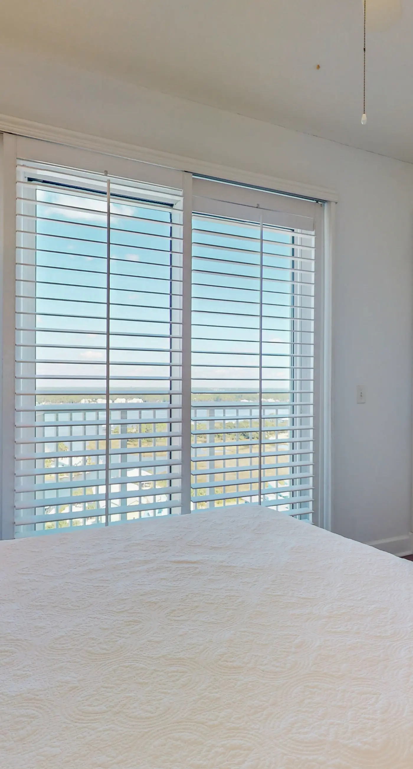 Penthouse-level, waterfront condo with epic Gulf-view balcony, pools, & gym