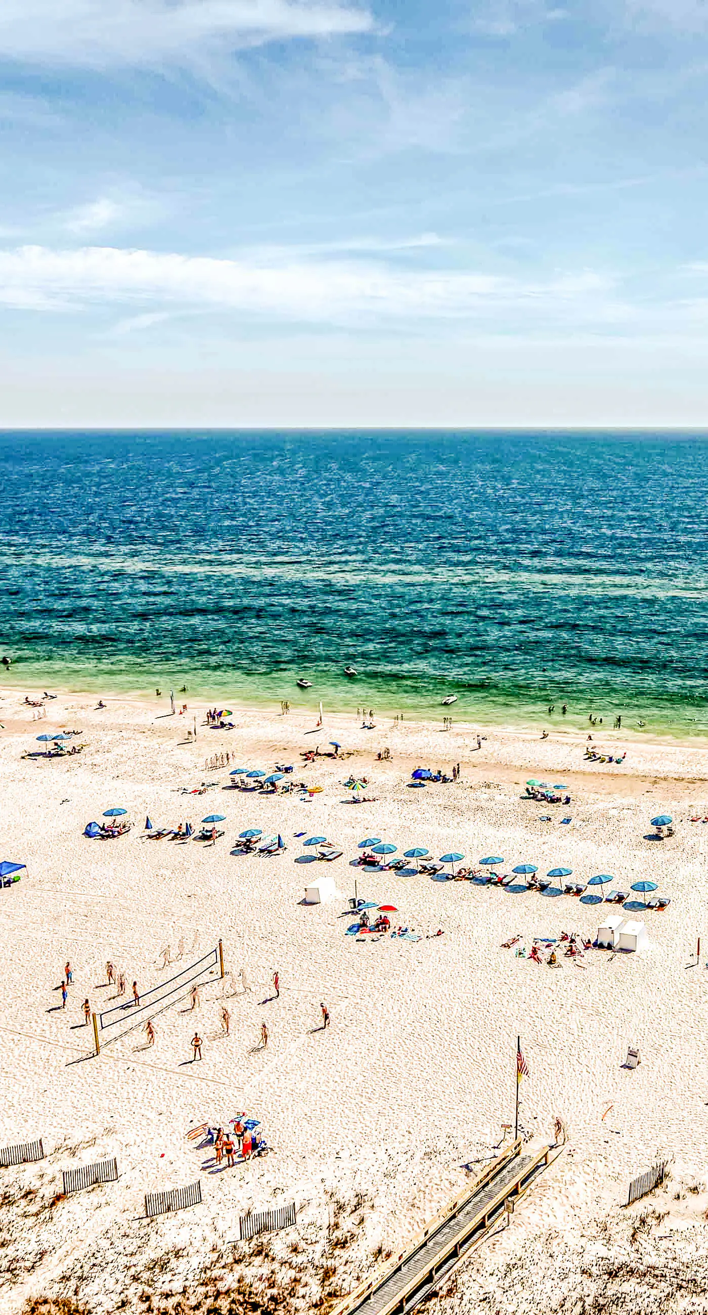 Gulf front condo with multiple community pools, a private balcony, & gym