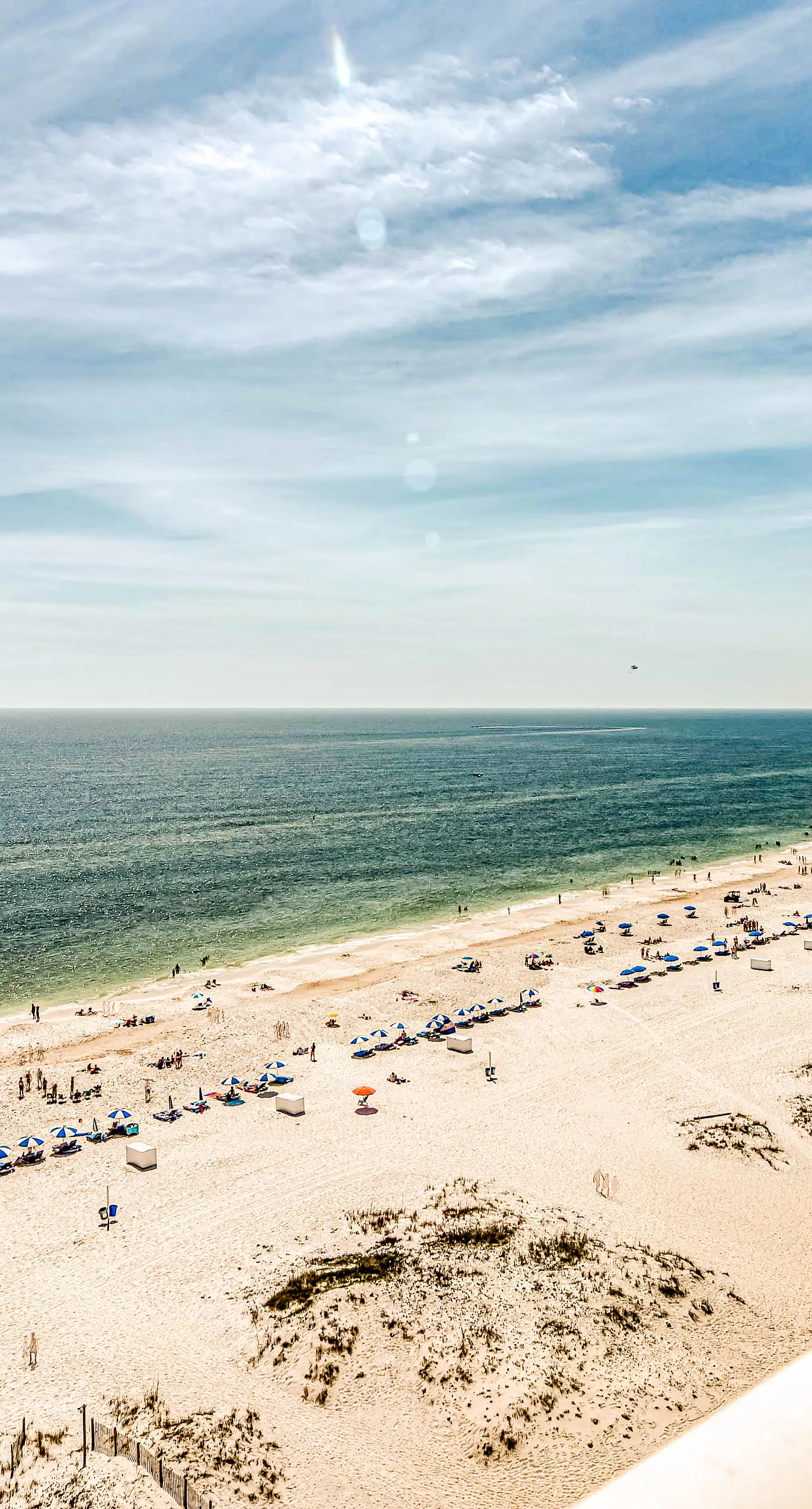 Gulf front condo with multiple community pools, a private balcony, & gym