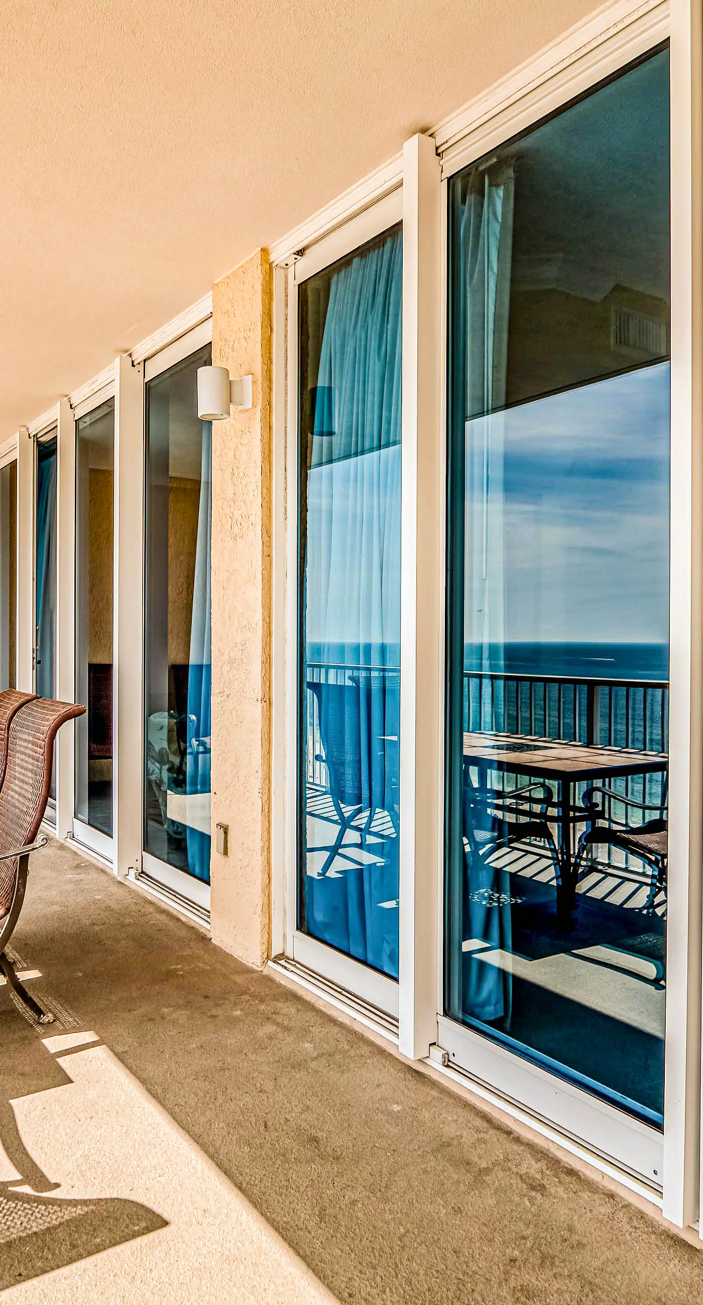 Gulf front condo with multiple community pools, a private balcony, & gym