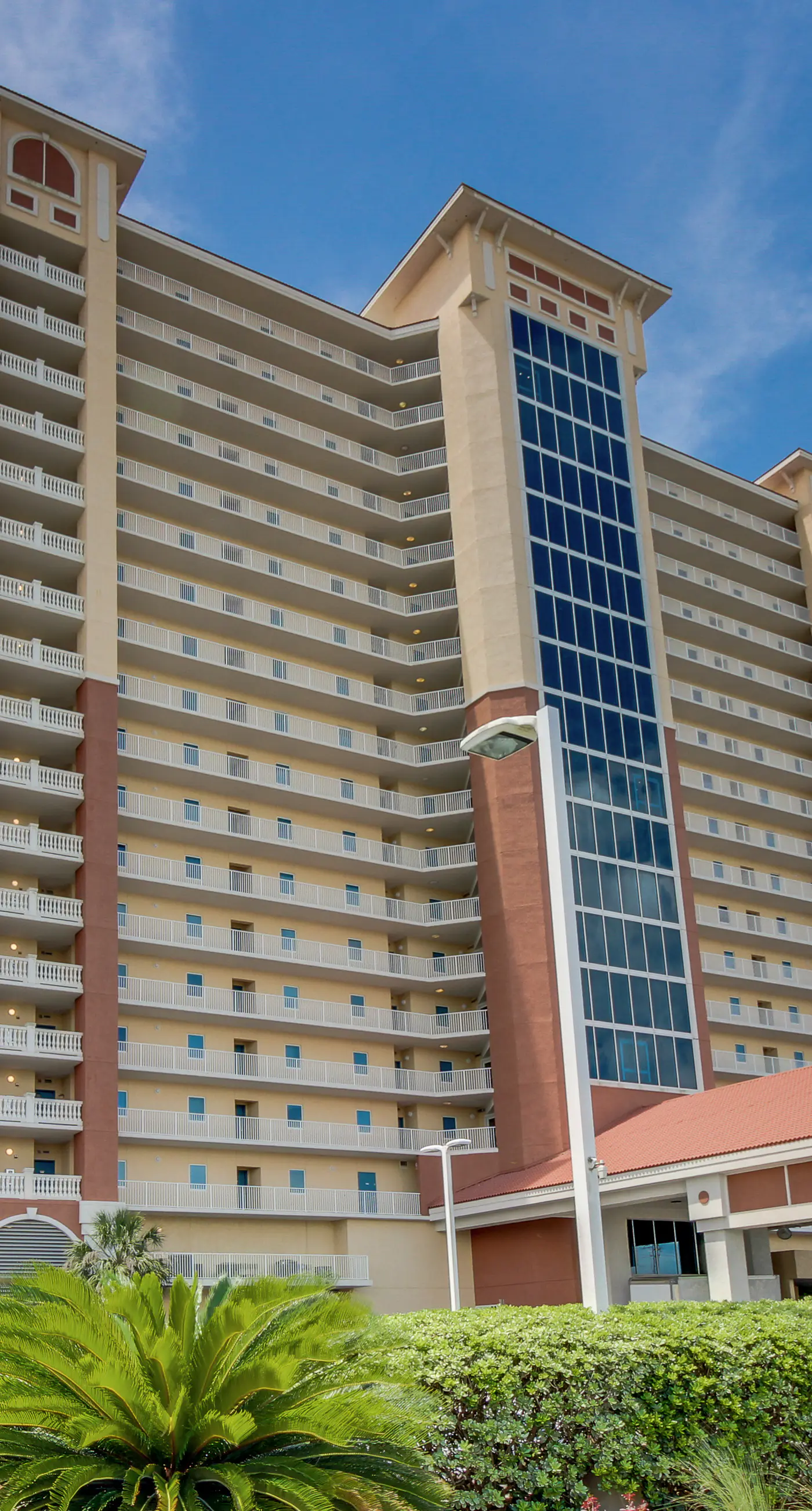 Gulf front condo with multiple community pools, a private balcony, & gym