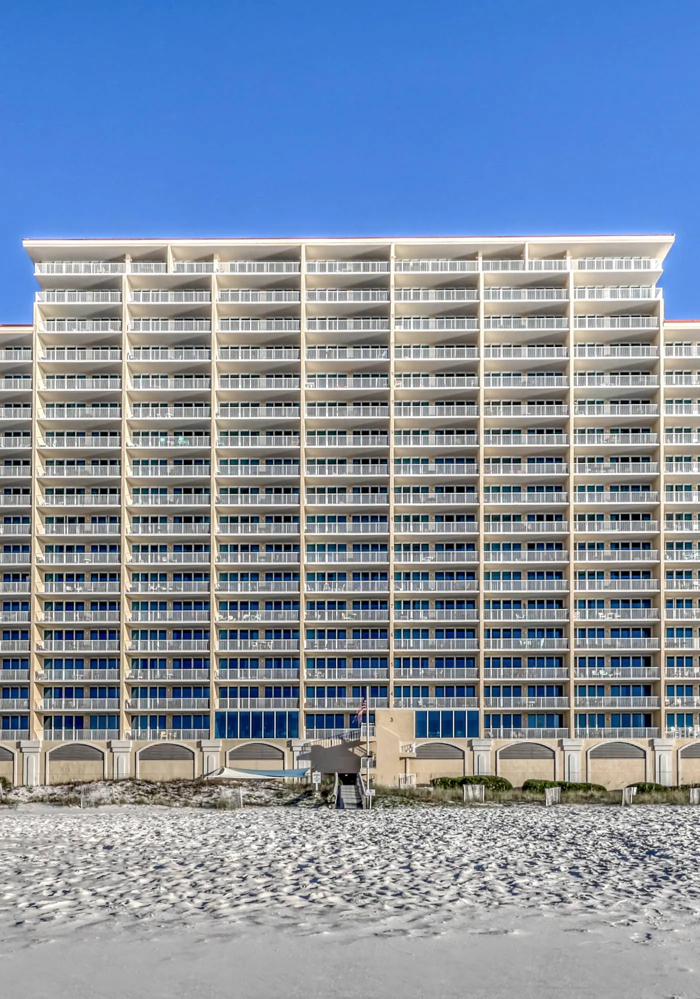 Gulf front condo with multiple community pools, a private balcony, & gym