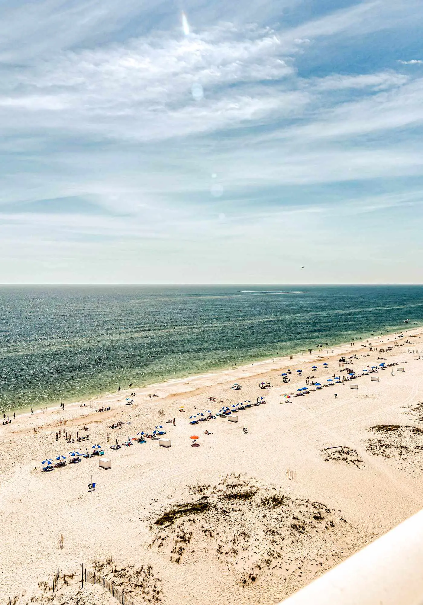 Gulf front condo with multiple community pools, a private balcony, & gym