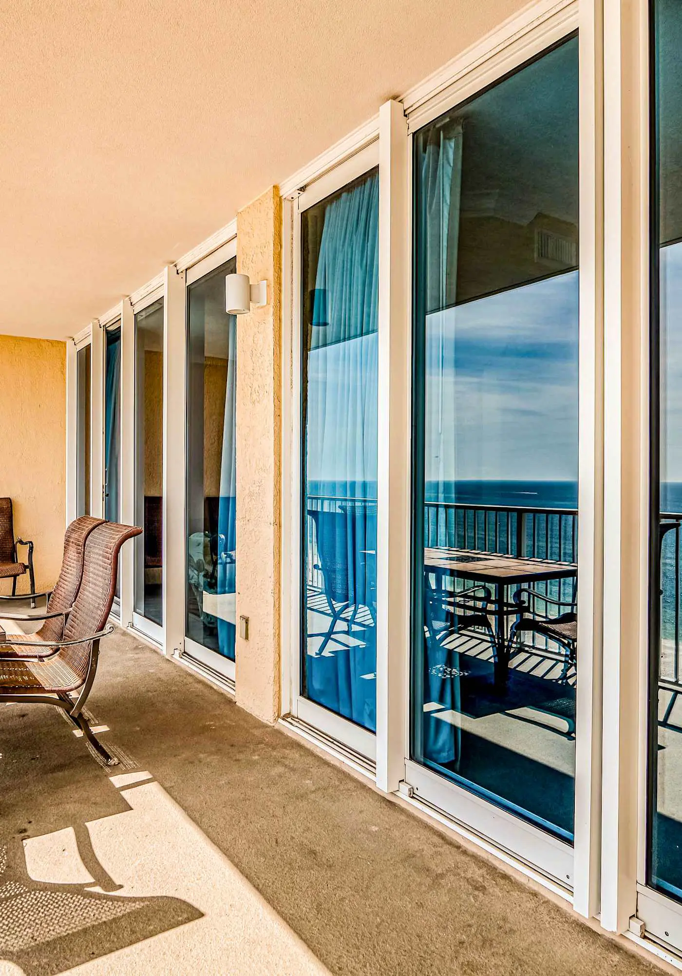 Gulf front condo with multiple community pools, a private balcony, & gym