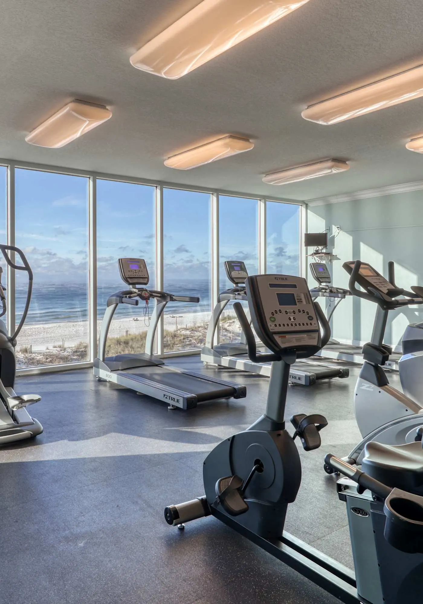 Gulf front condo with multiple community pools, a private balcony, & gym