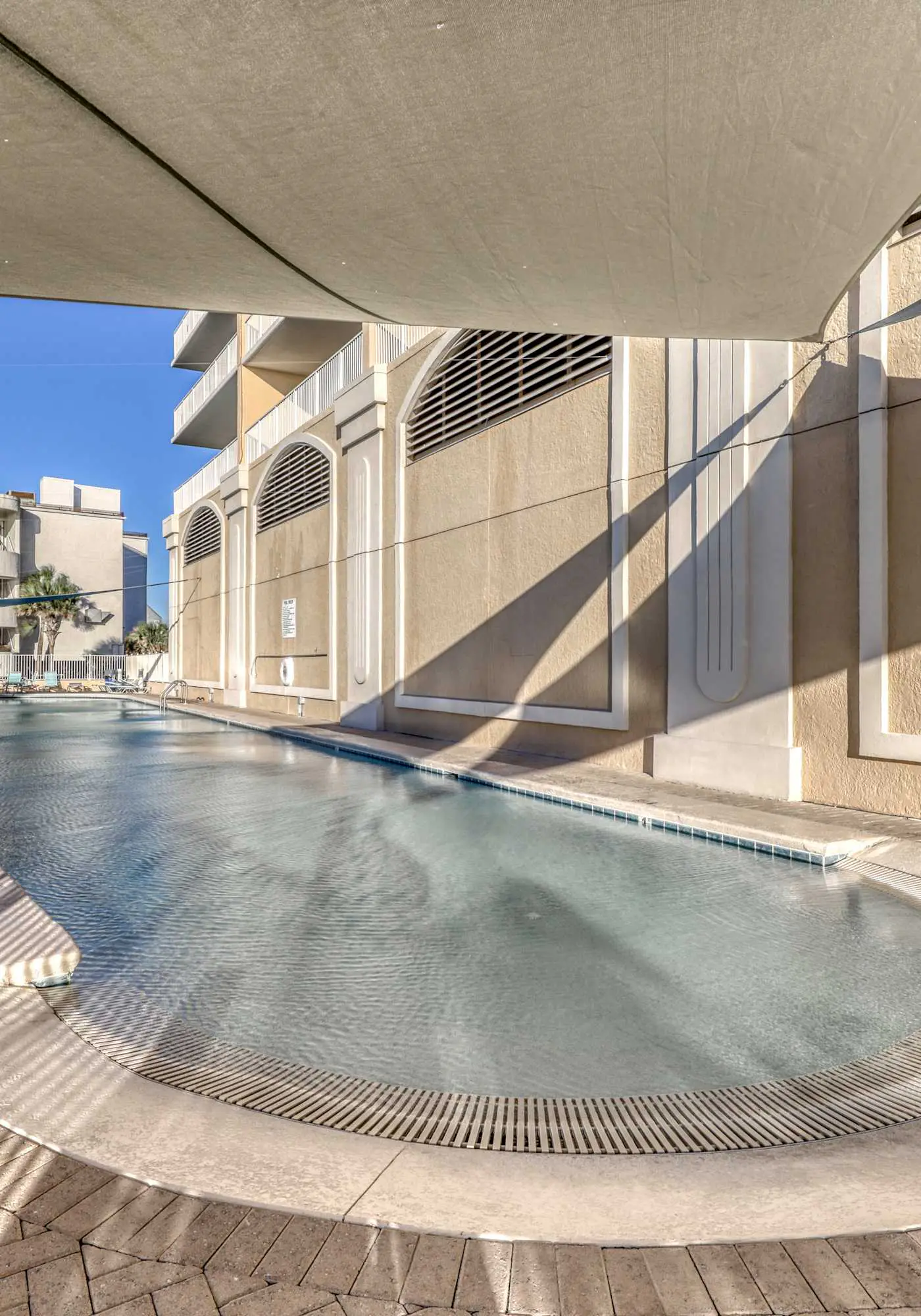 Gulf front condo with multiple community pools, a private balcony, & gym