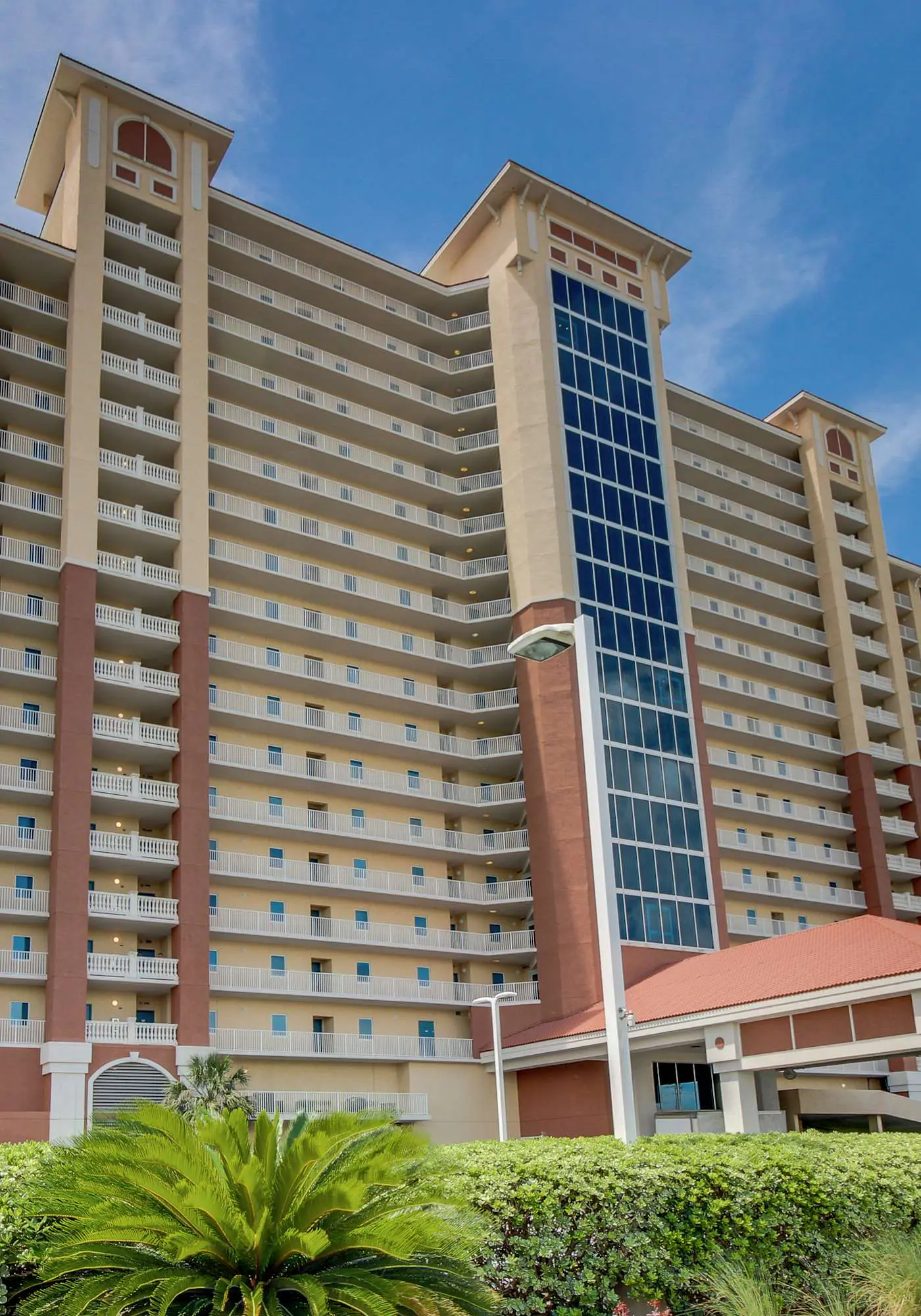Gulf front condo with multiple community pools, a private balcony, & gym