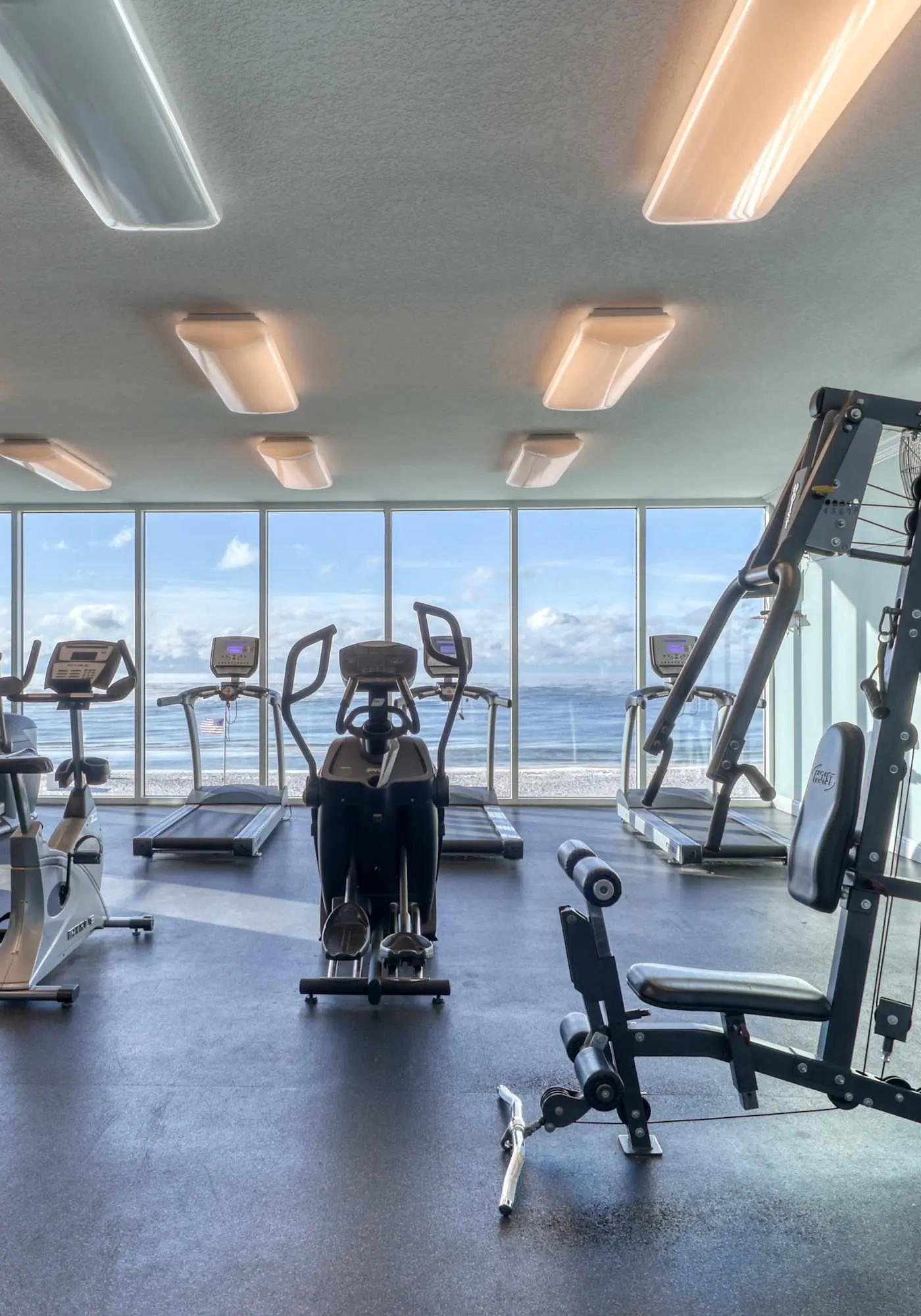 Gulf front condo with multiple community pools, a private balcony, & gym