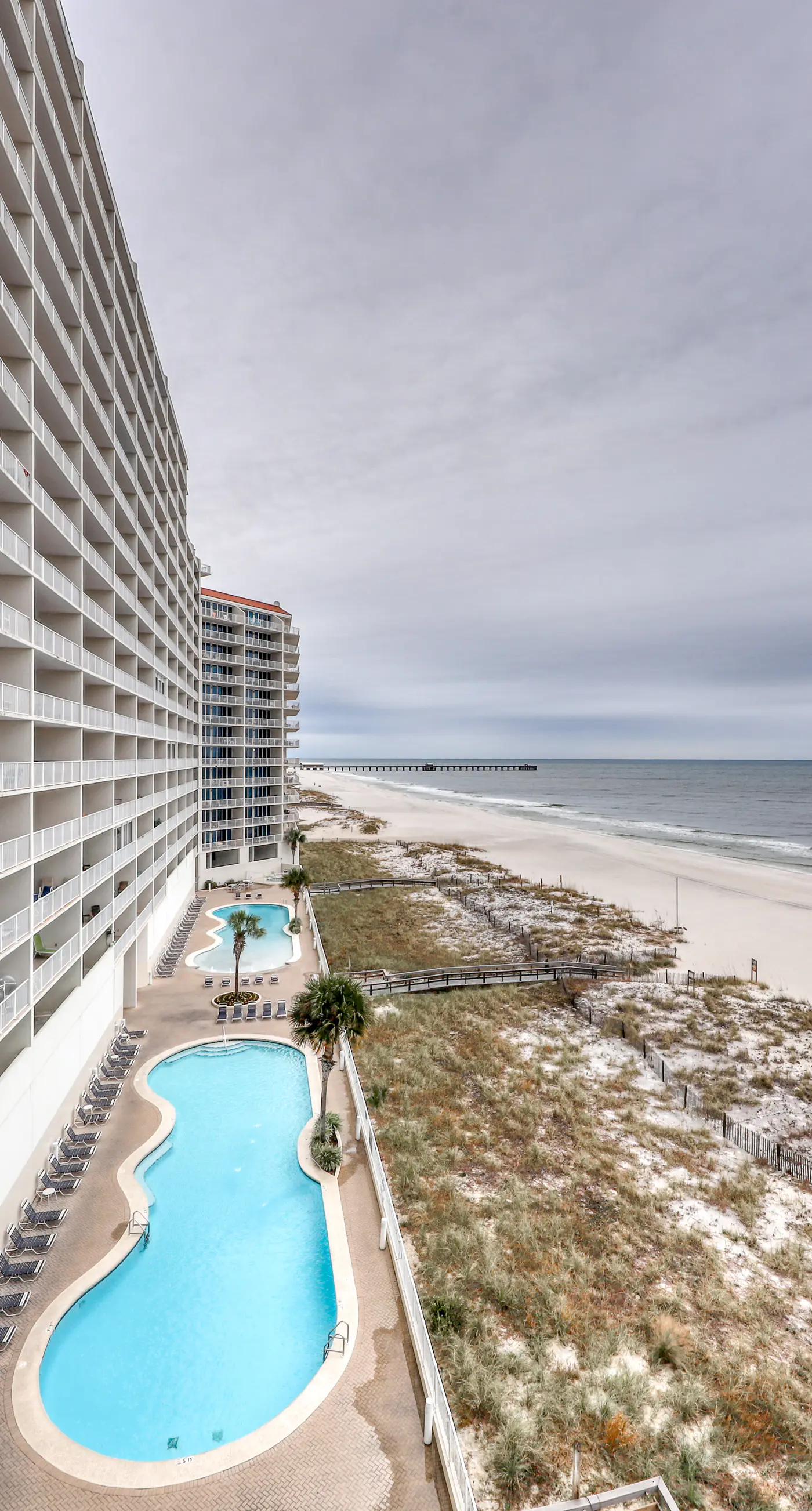 Gulf-front condo w/ private balcony & shared pools, hot tubs & gym