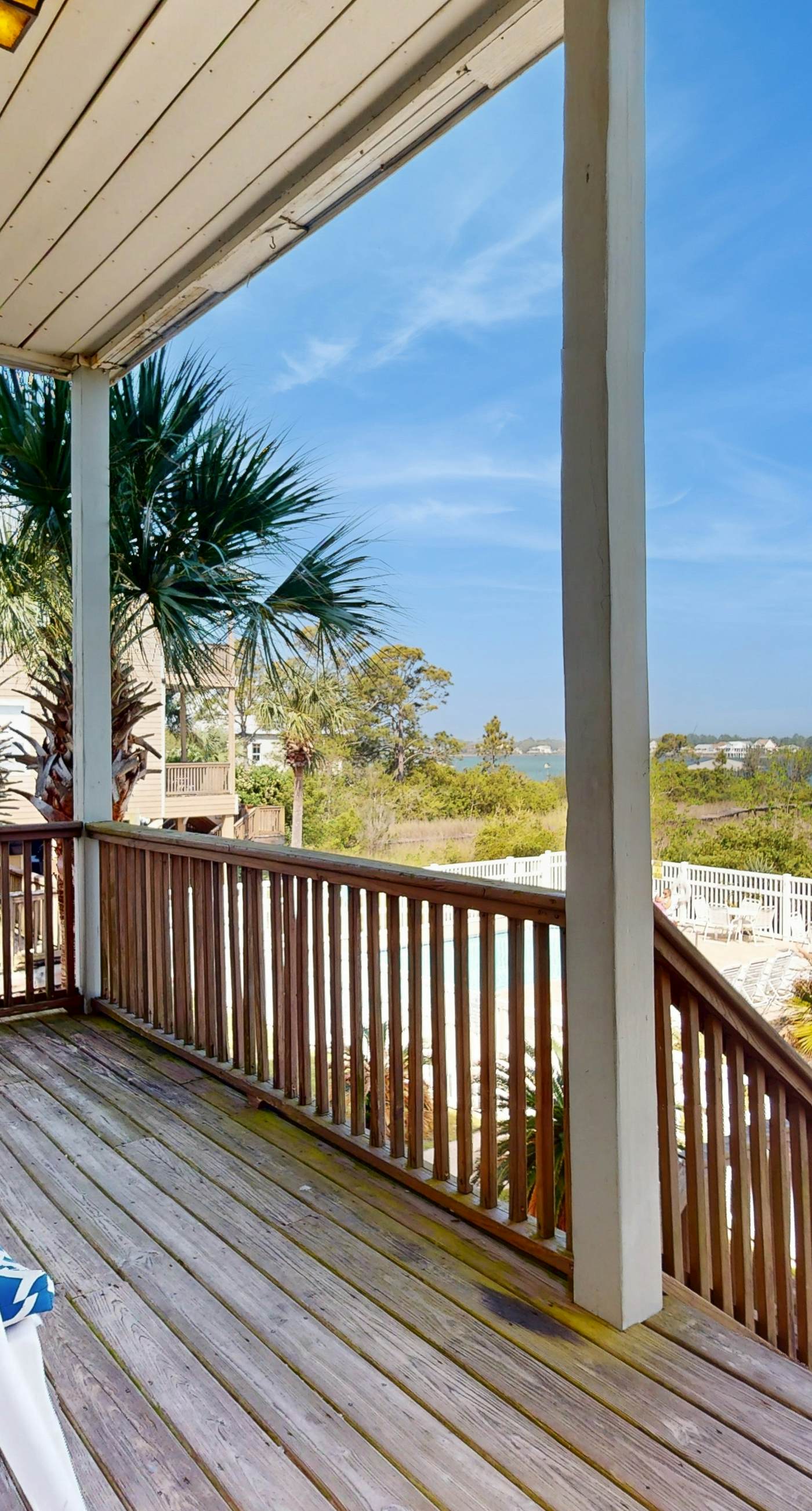 Lagoon-front dog-friendly duplex with heated outdoor pool, hot tub, & central AC