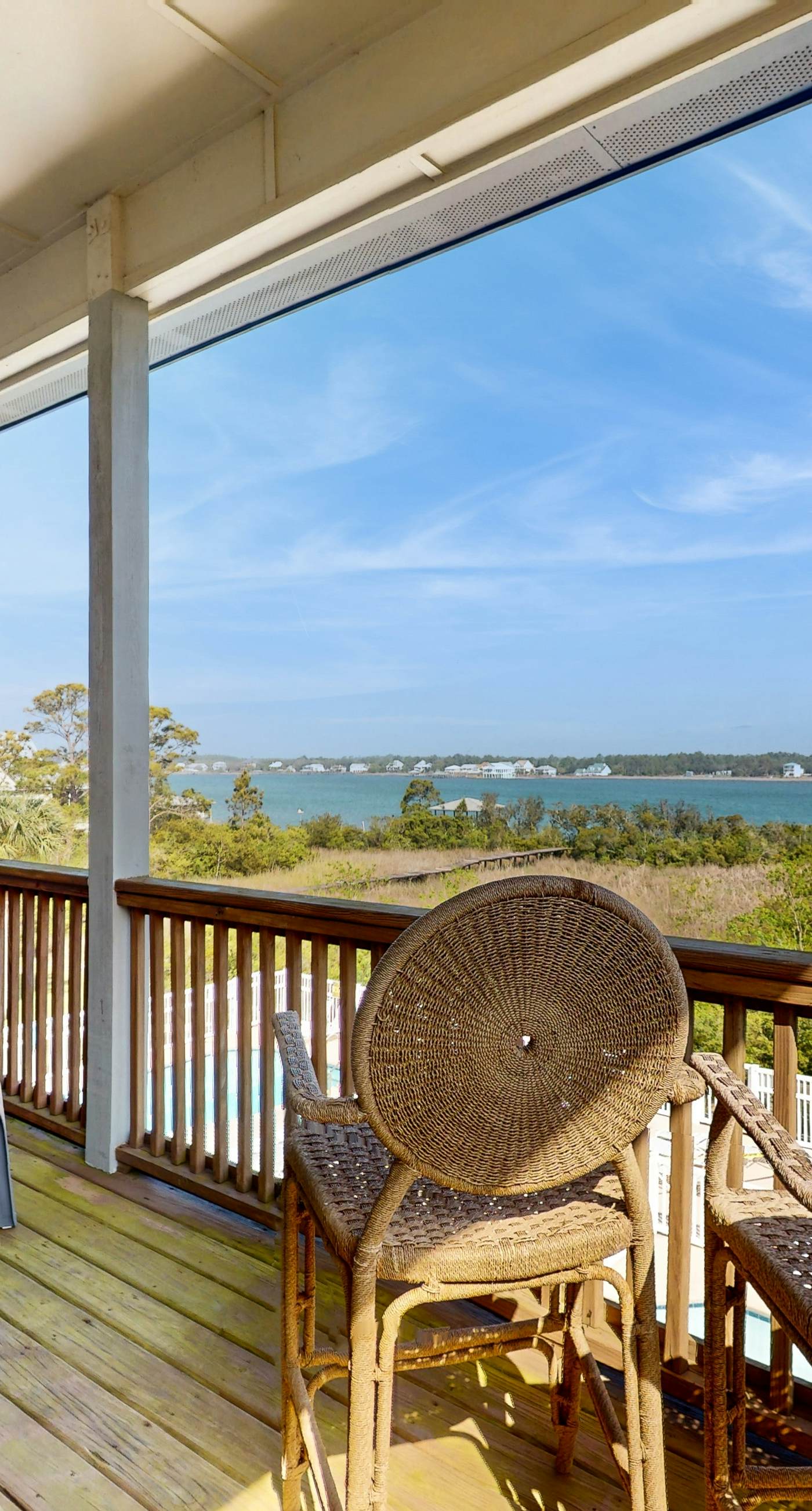 Lagoon-front dog-friendly duplex with heated outdoor pool, hot tub, & central AC