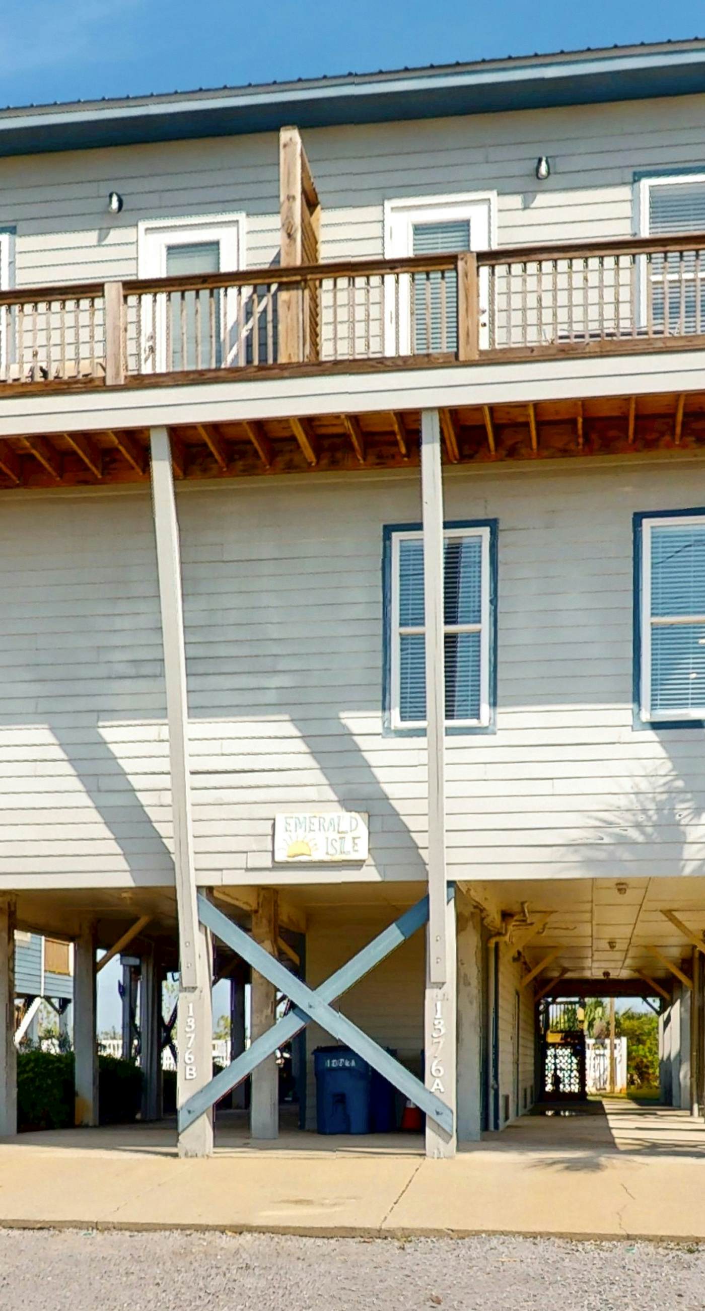 Lagoon-front dog-friendly duplex with heated outdoor pool, hot tub, & central AC