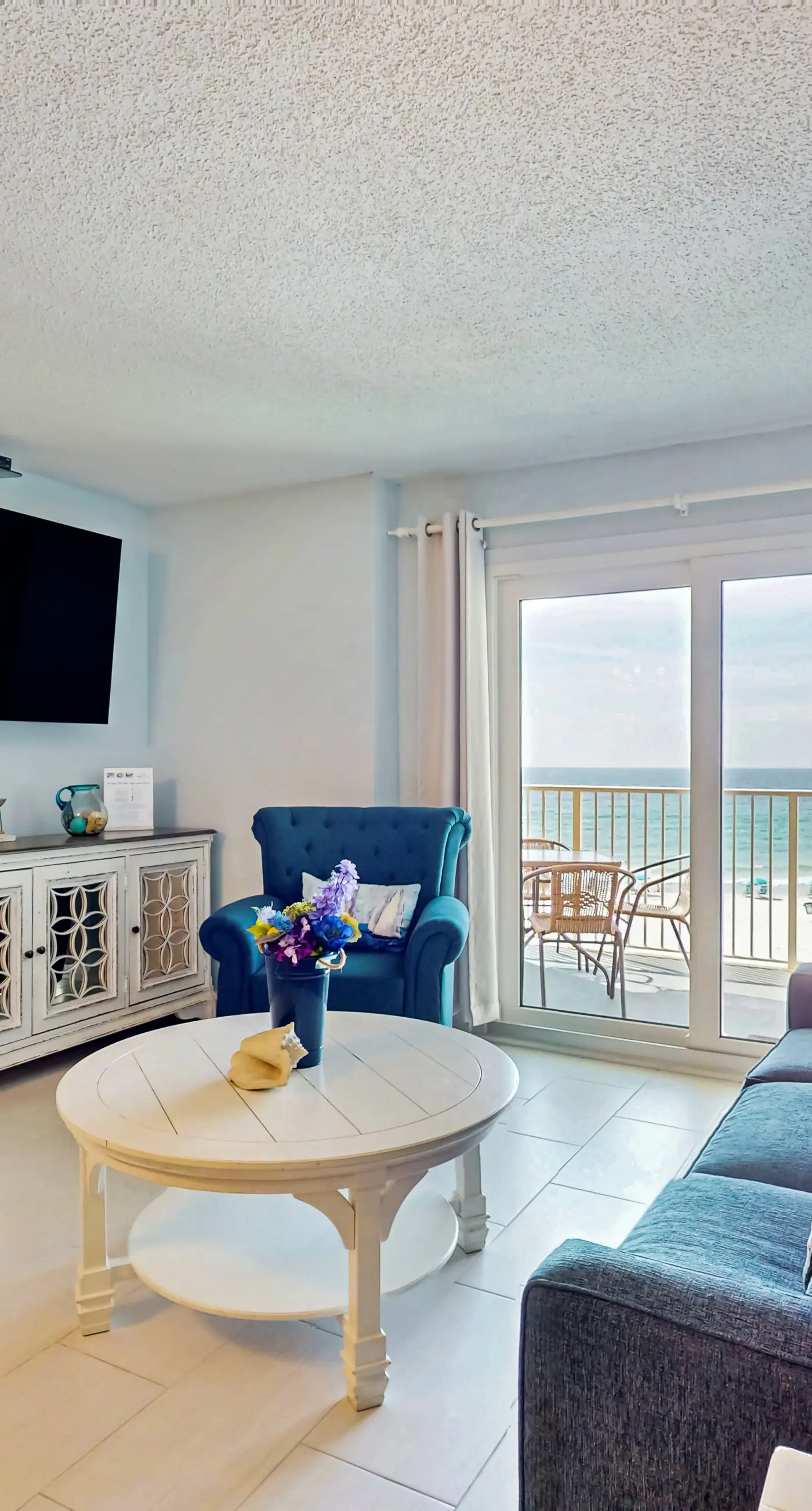 Gulf-front 3rd-floor condo with outdoor pool, central AC, & balcony