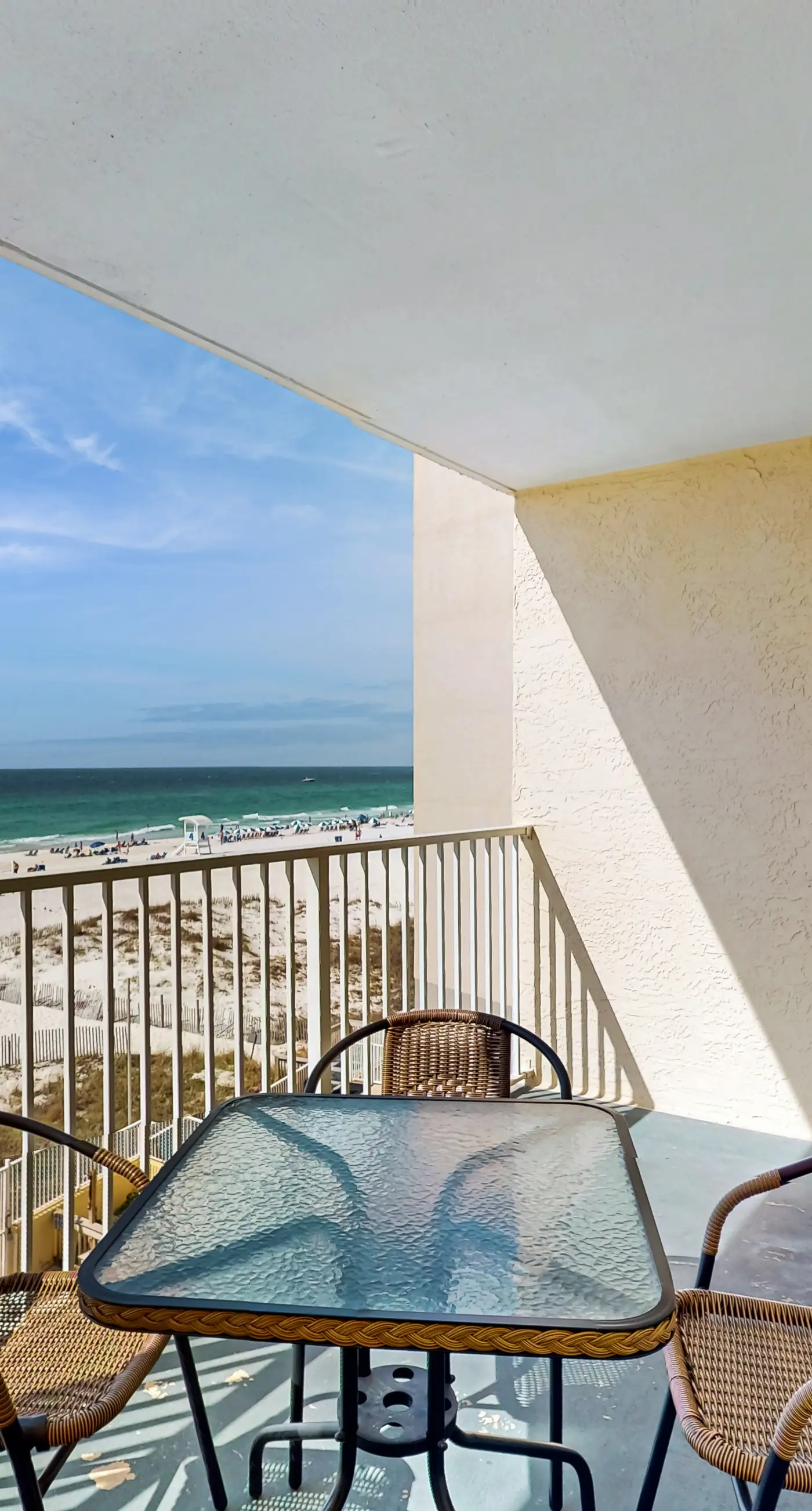Gulf-front 3rd-floor condo with outdoor pool, central AC, & balcony