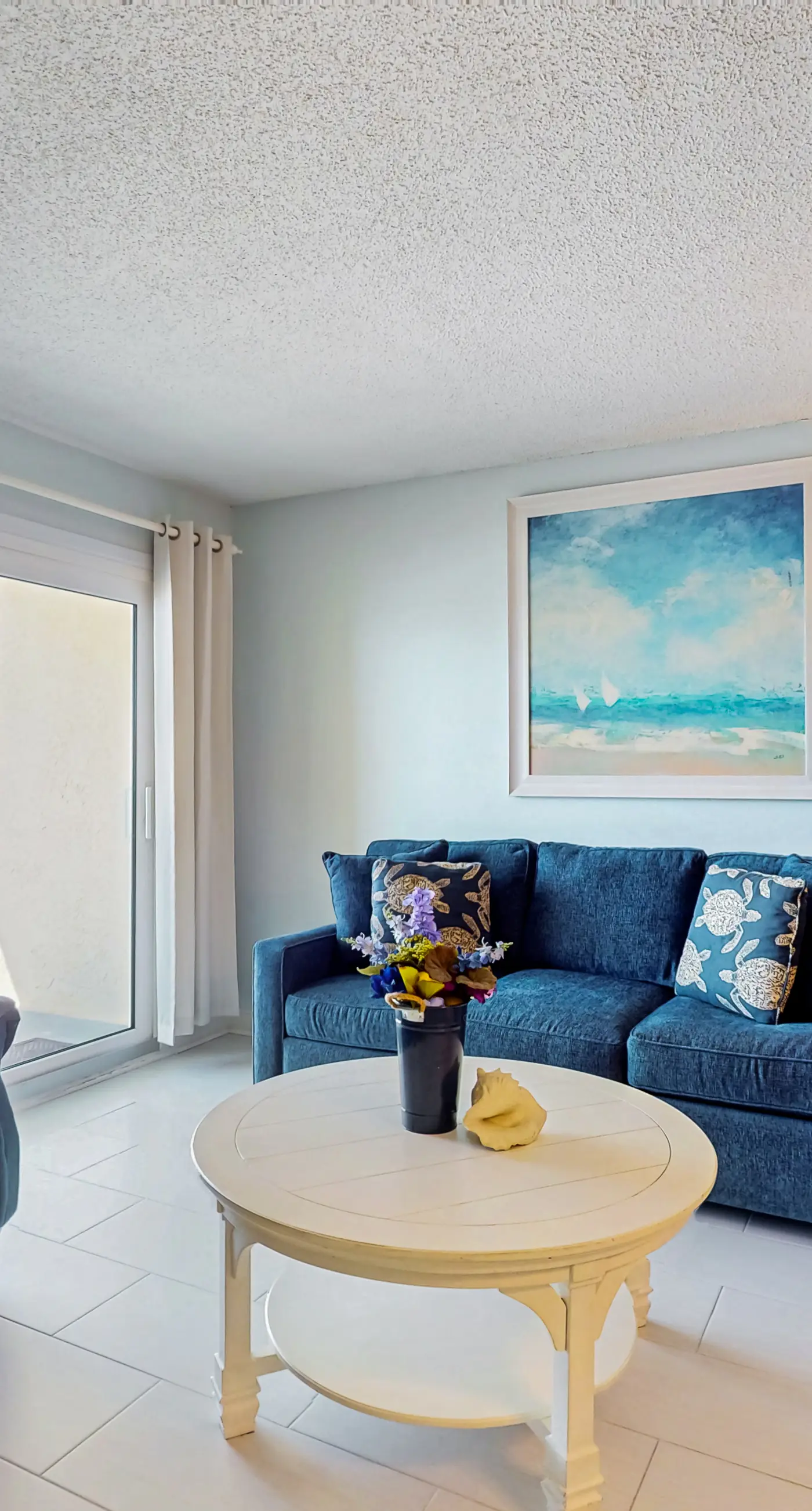 Gulf-front 3rd-floor condo with outdoor pool, central AC, & balcony