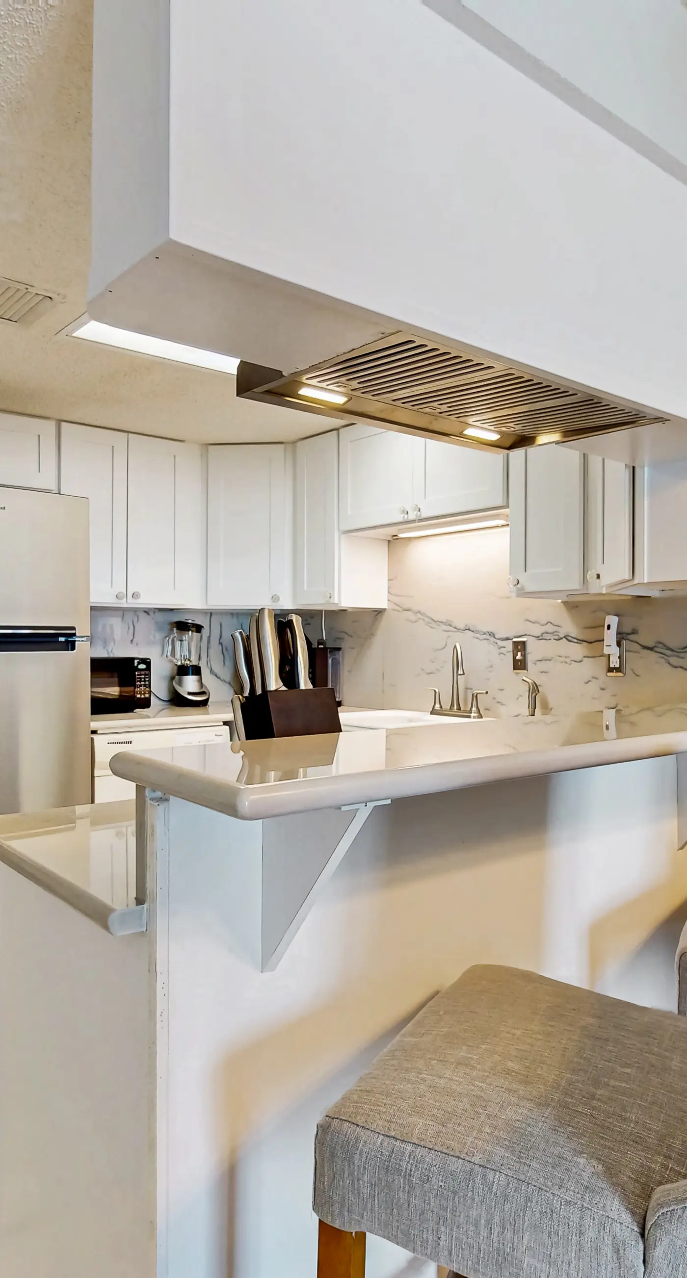 Gulf-front 3rd-floor condo with outdoor pool, central AC, & balcony