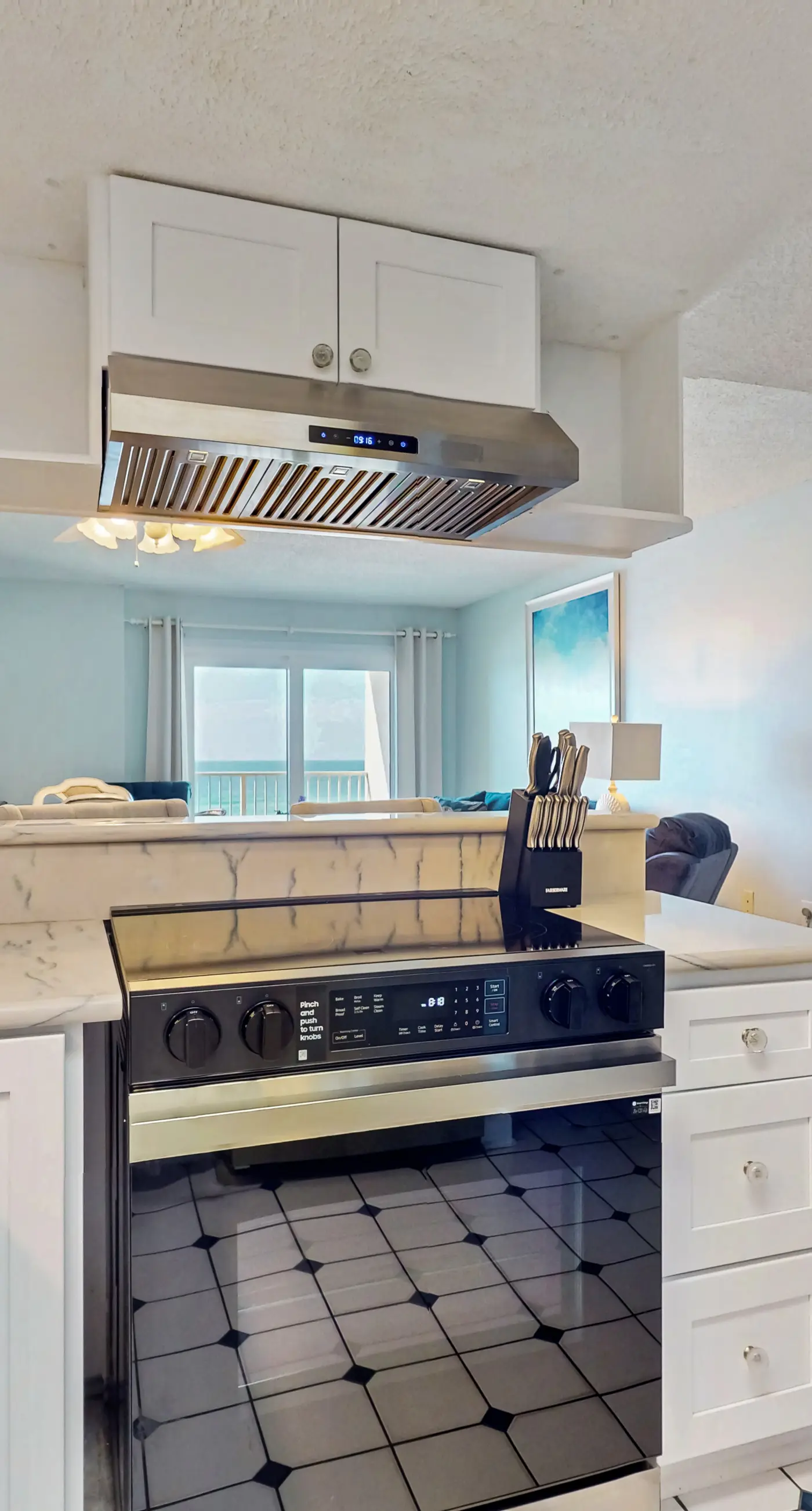 Gulf-front 3rd-floor condo with outdoor pool, central AC, & balcony