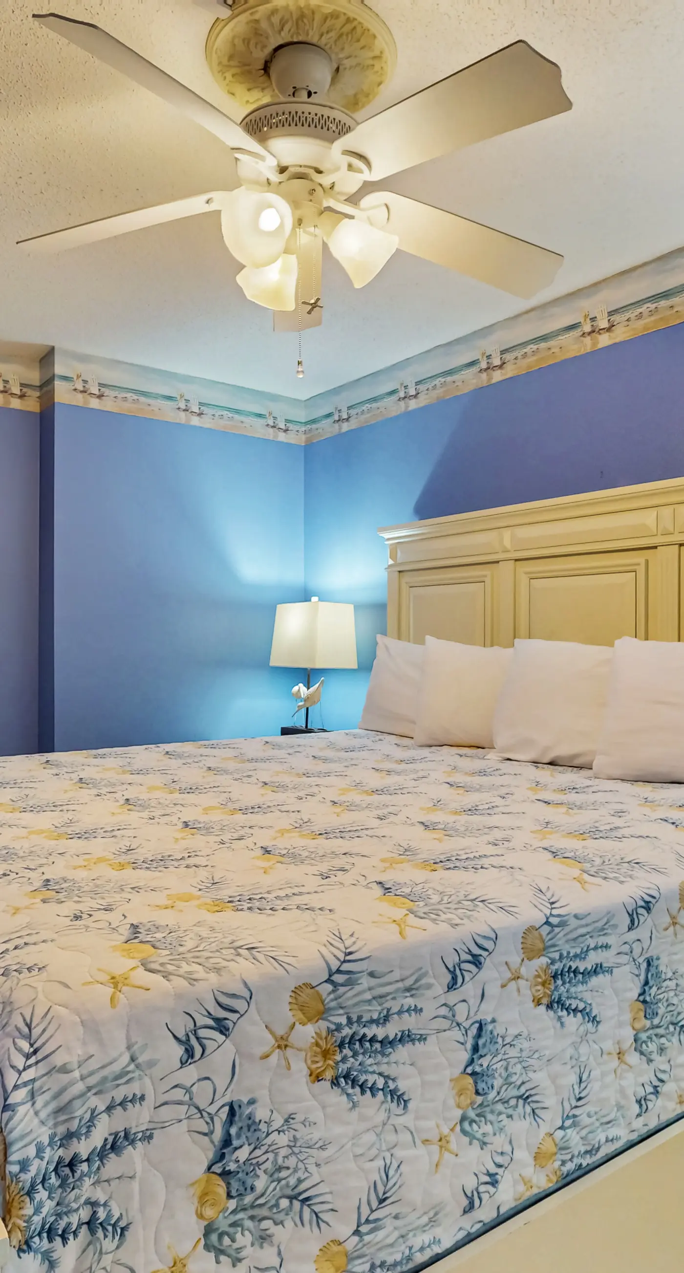 Gulf-front 3rd-floor condo with outdoor pool, central AC, & balcony