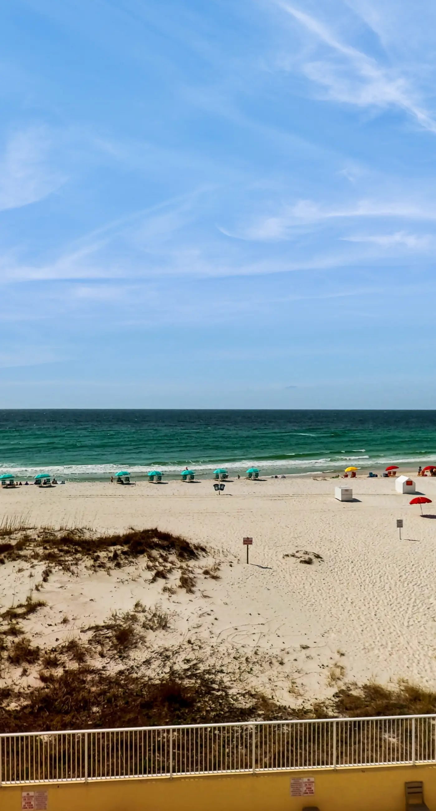 Gulf-front 3rd-floor condo with outdoor pool, central AC, & balcony