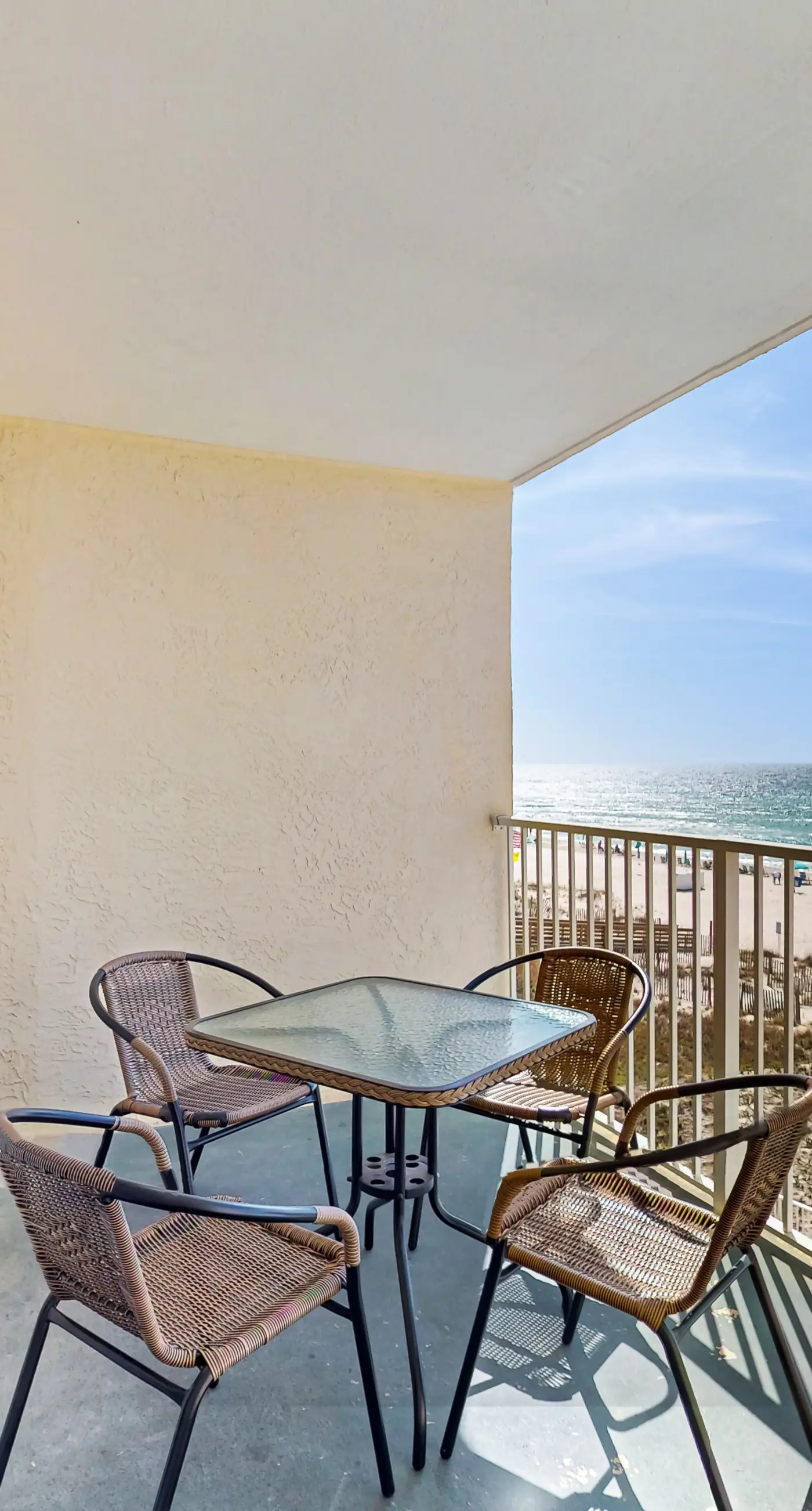 Gulf-front 3rd-floor condo with outdoor pool, central AC, & balcony