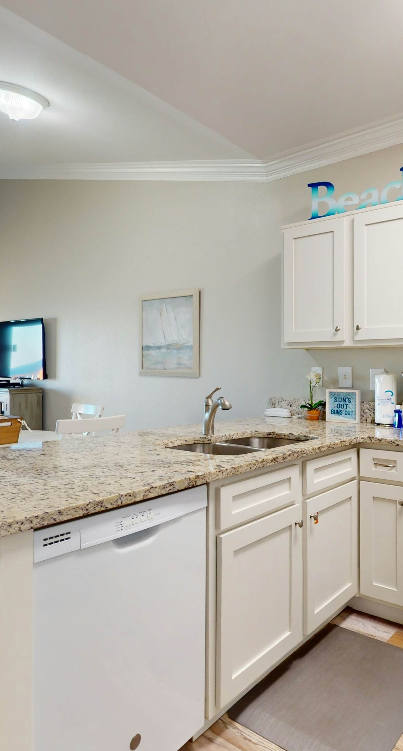 Delightful beachfront condo w/ a furnished balcony, views, & a shared pool