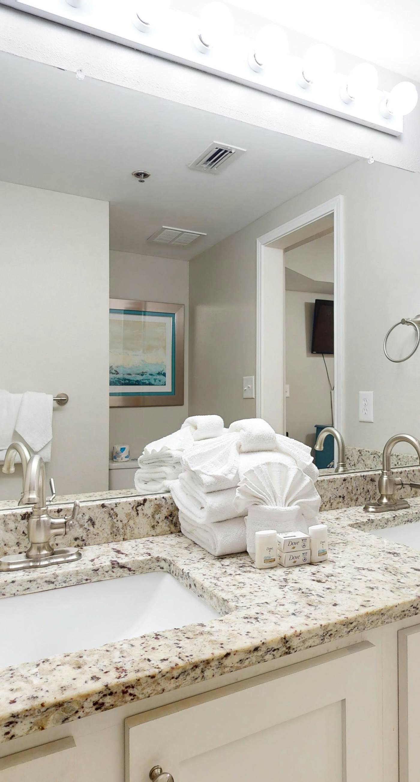 Delightful beachfront condo w/ a furnished balcony, views, & a shared pool