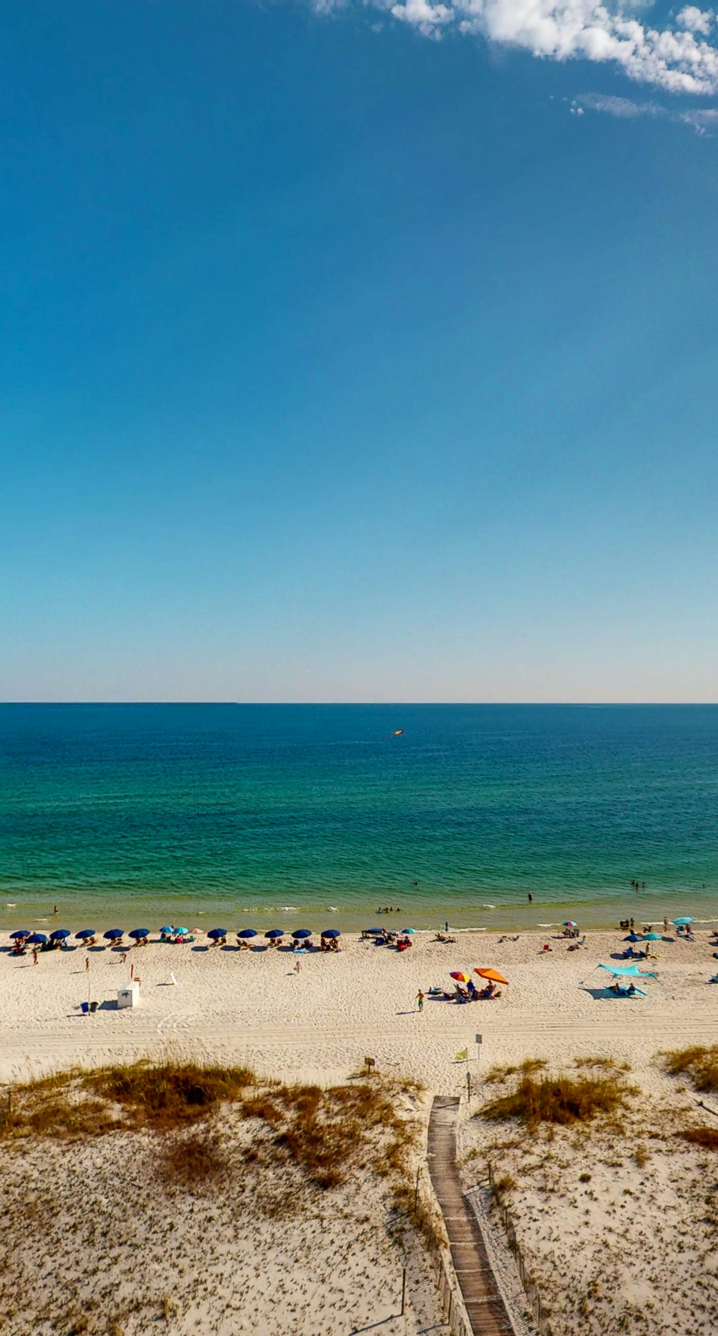 Delightful beachfront condo w/ a furnished balcony, views, & a shared pool