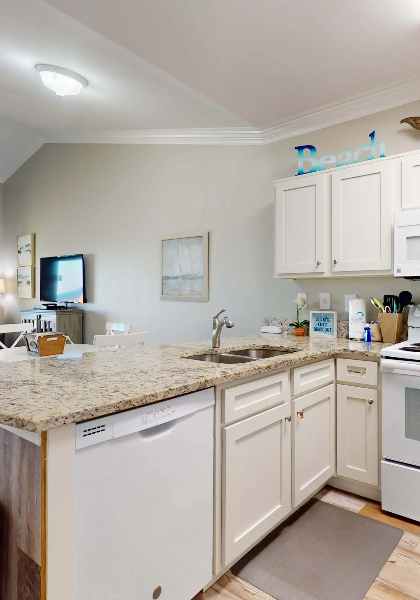 Delightful beachfront condo w/ a furnished balcony, views, & a shared pool