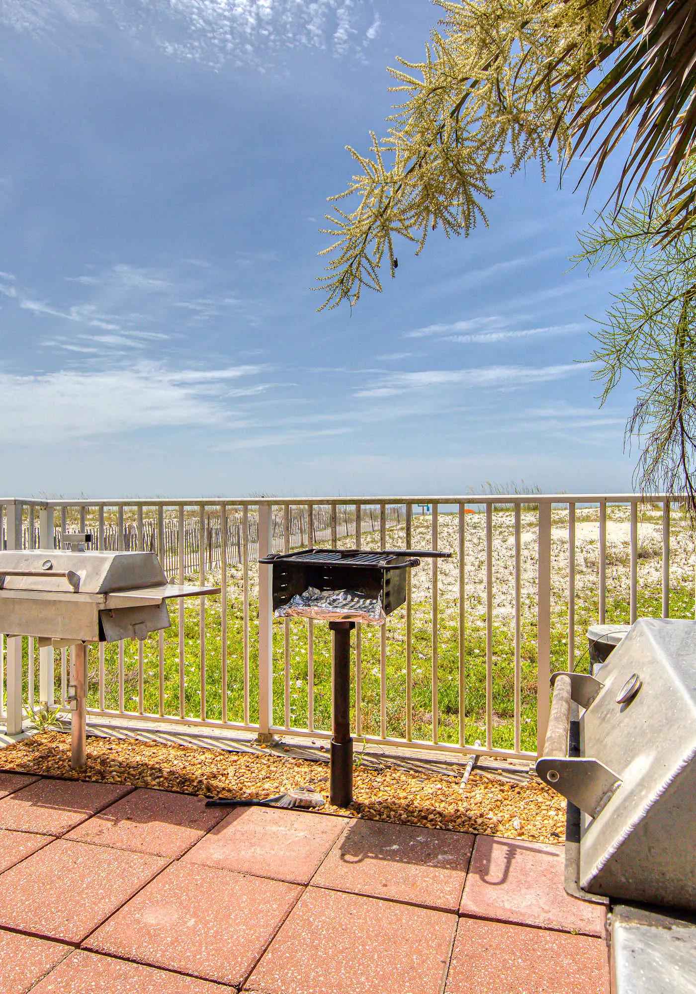 Delightful beachfront condo w/ a furnished balcony, views, & a shared pool