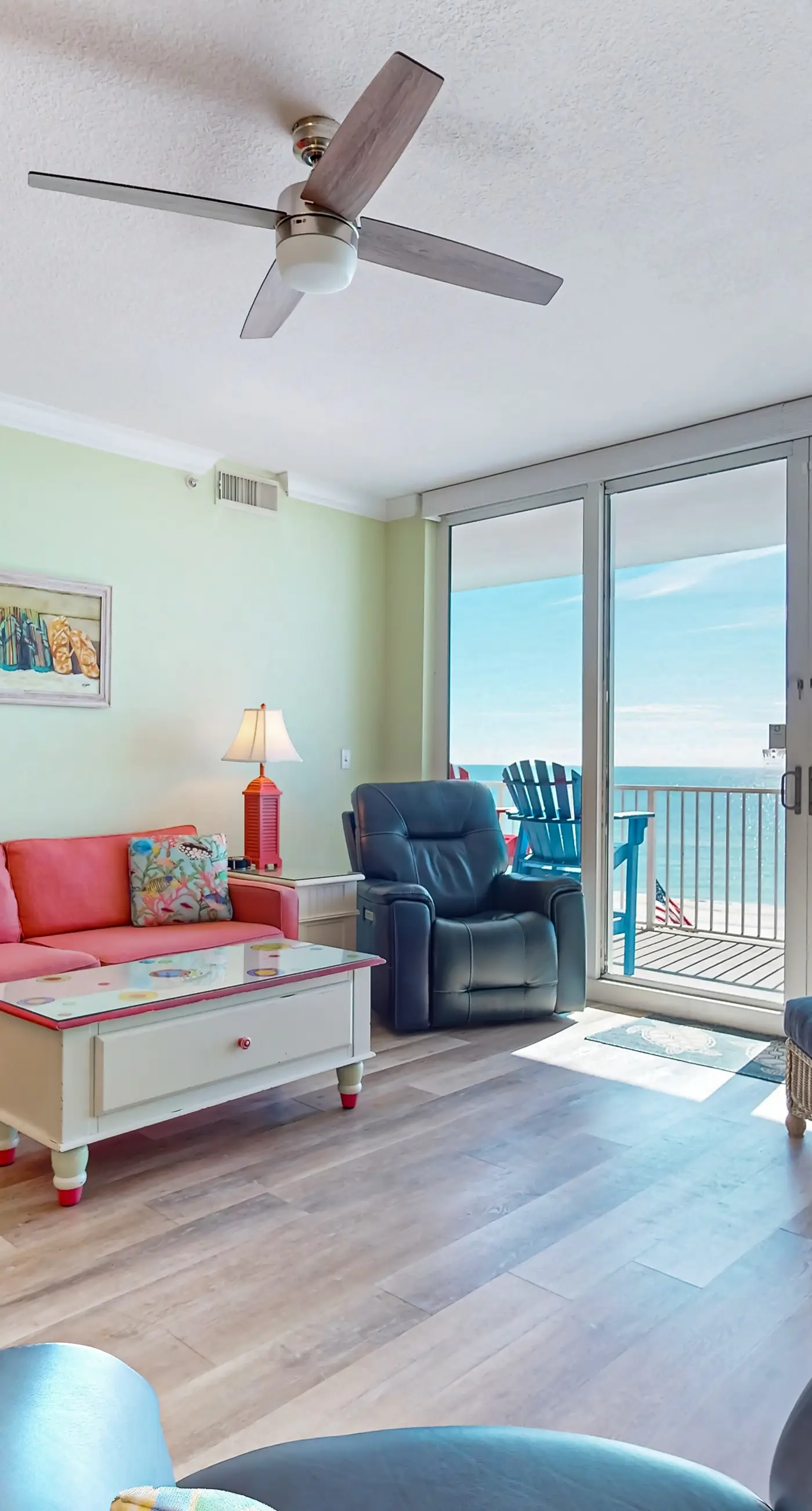 Colorful beachfront condo with Gulf views, pool, sauna, gym & W/D