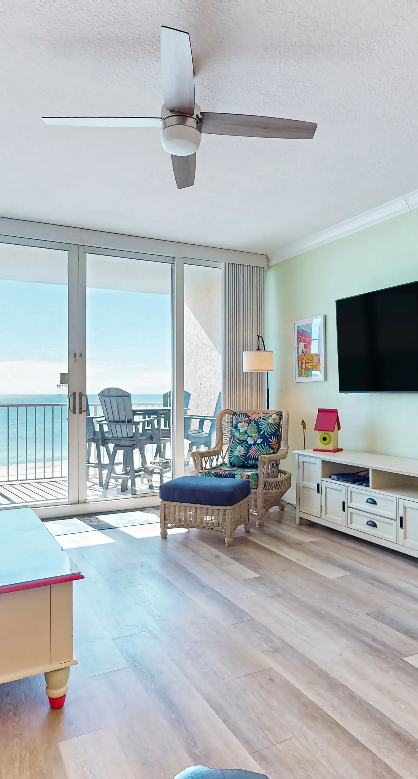 Colorful beachfront condo with Gulf views, pool, sauna, gym & W/D