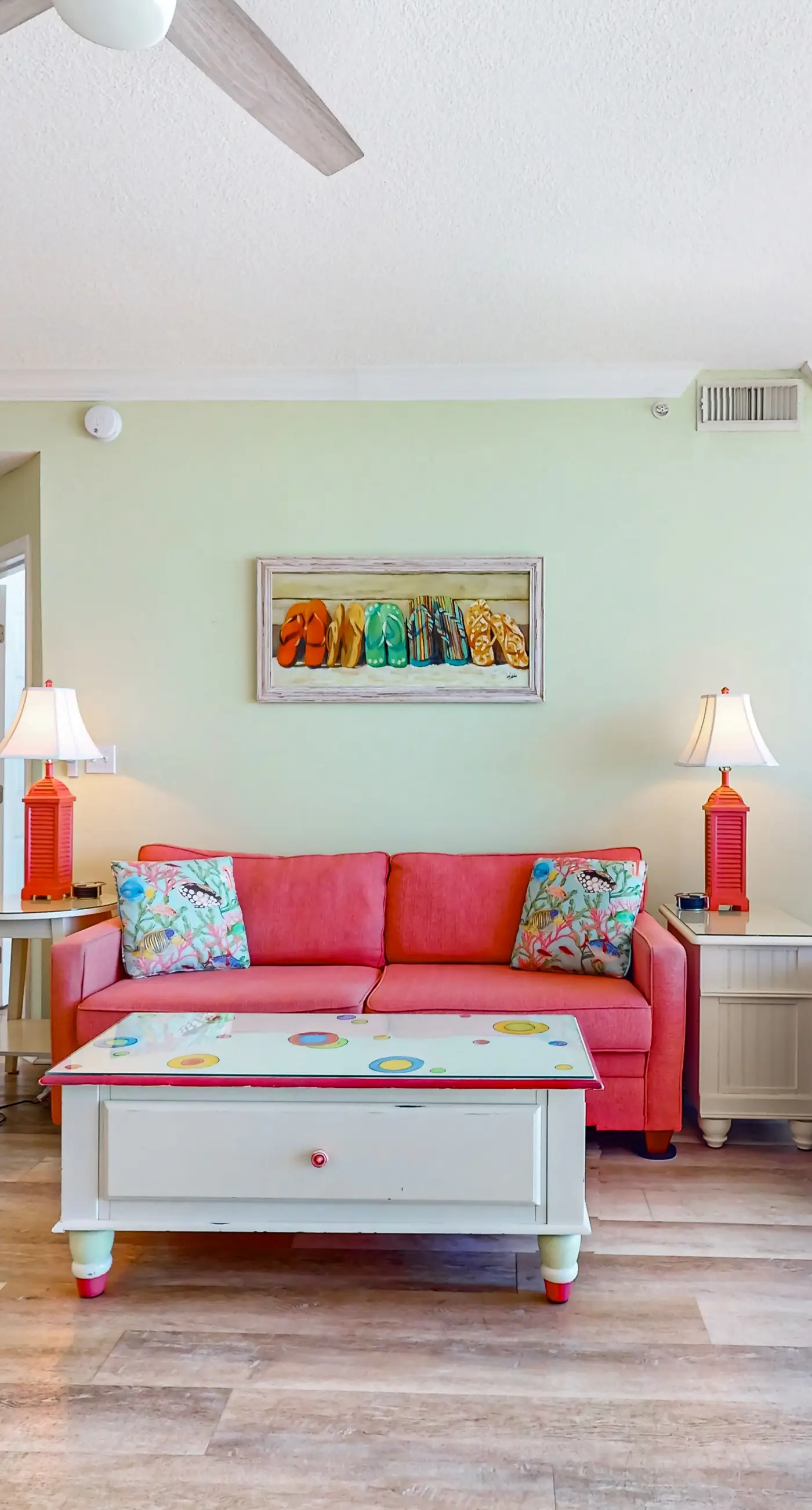 Colorful beachfront condo with Gulf views, pool, sauna, gym & W/D