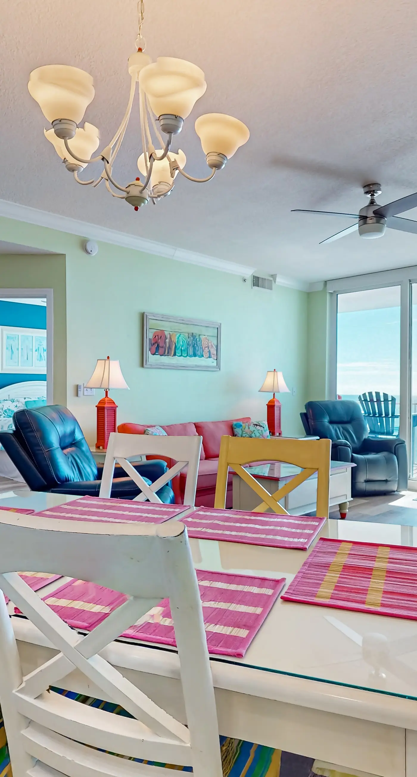 Colorful beachfront condo with Gulf views, pool, sauna, gym & W/D