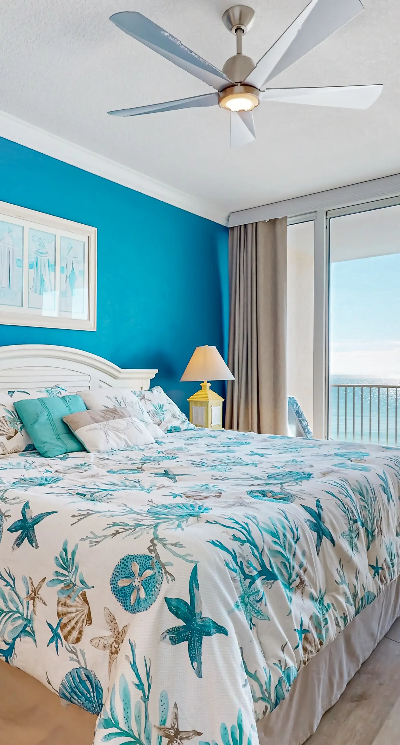 Colorful beachfront condo with Gulf views, pool, sauna, gym & W/D