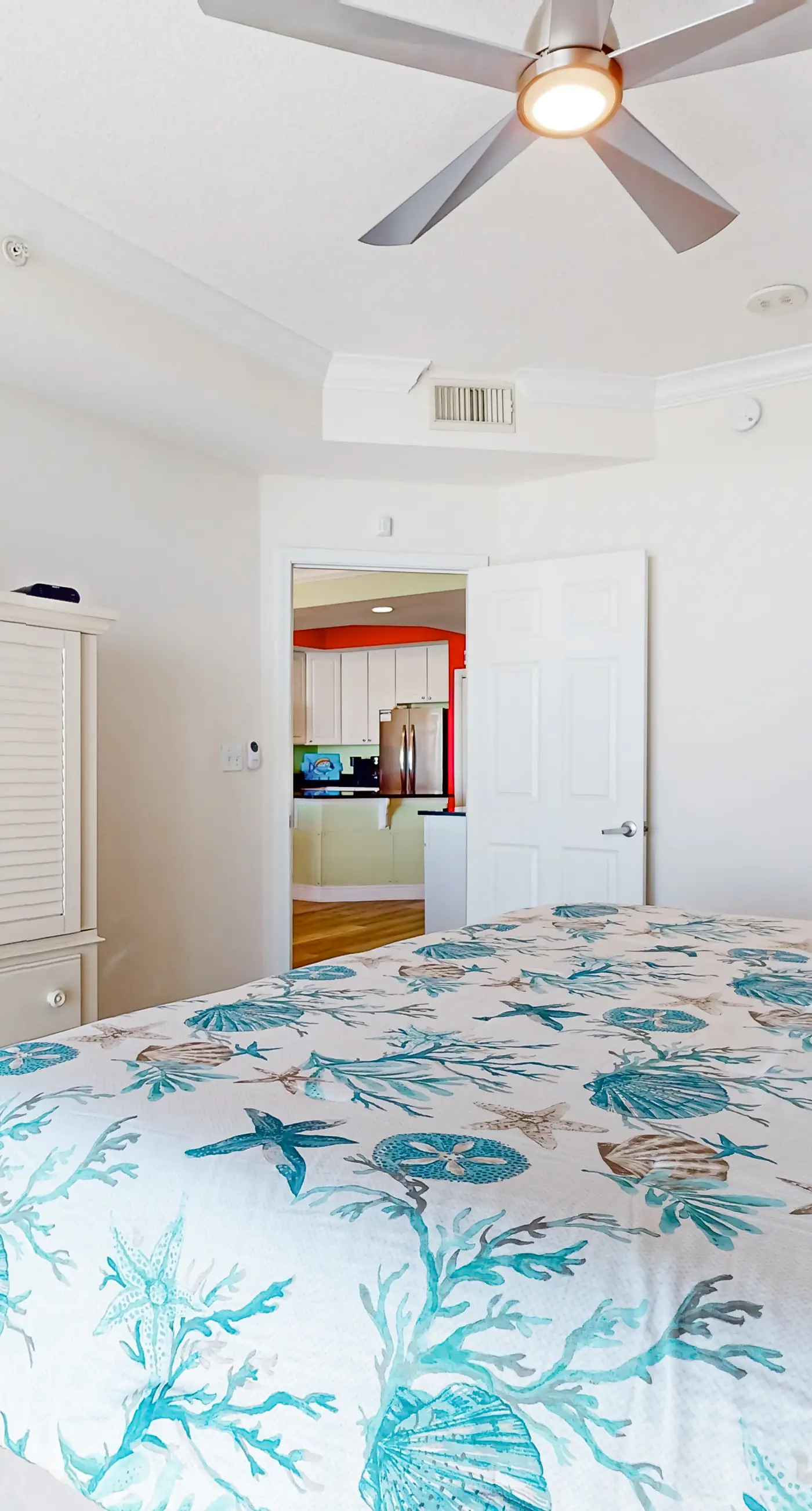 Colorful beachfront condo with Gulf views, pool, sauna, gym & W/D