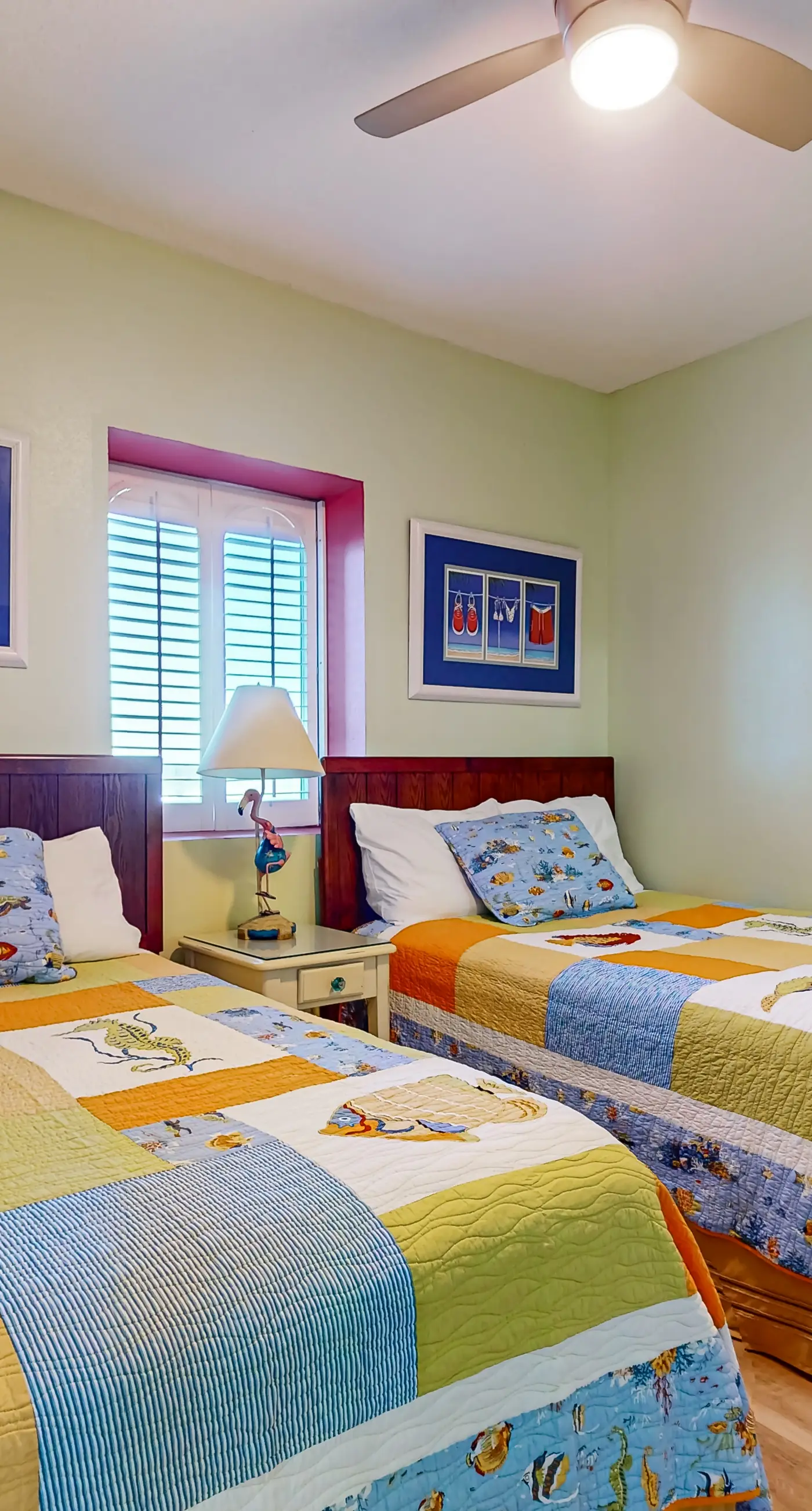 Colorful beachfront condo with Gulf views, pool, sauna, gym & W/D