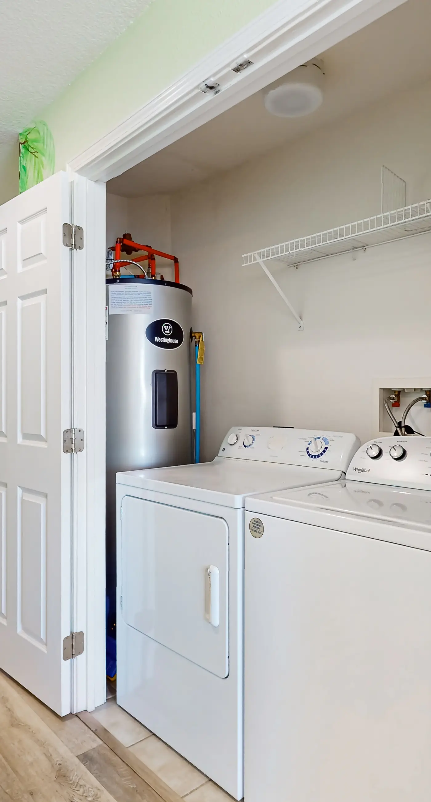 Colorful beachfront condo with Gulf views, pool, sauna, gym & W/D