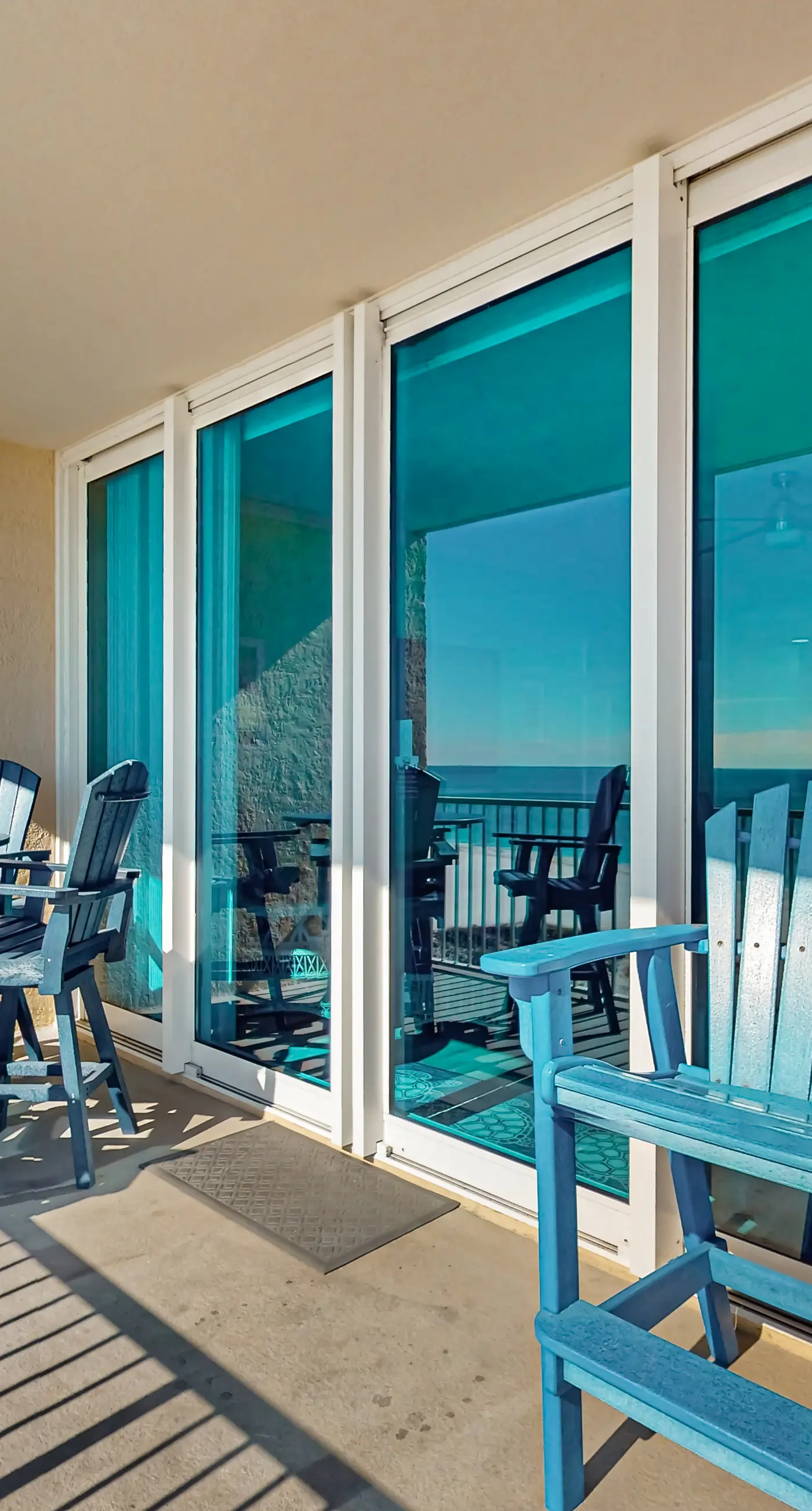 Colorful beachfront condo with Gulf views, pool, sauna, gym & W/D