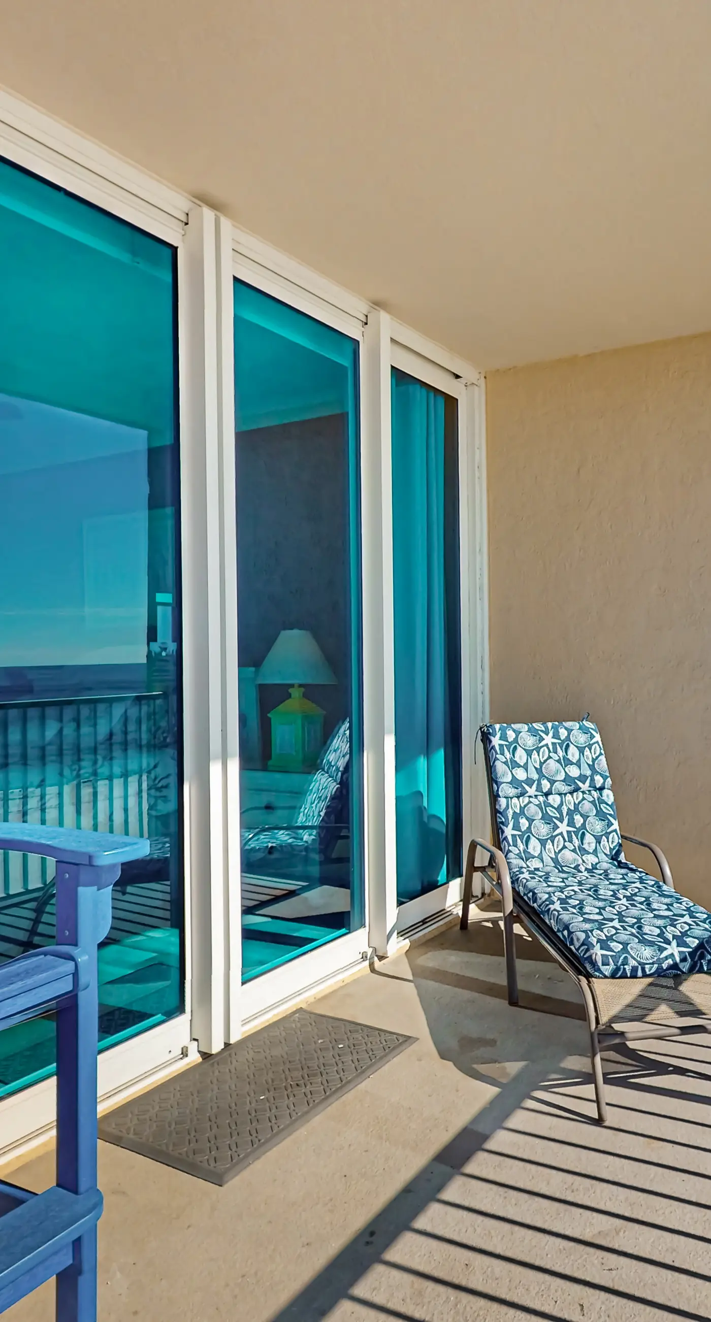 Colorful beachfront condo with Gulf views, pool, sauna, gym & W/D